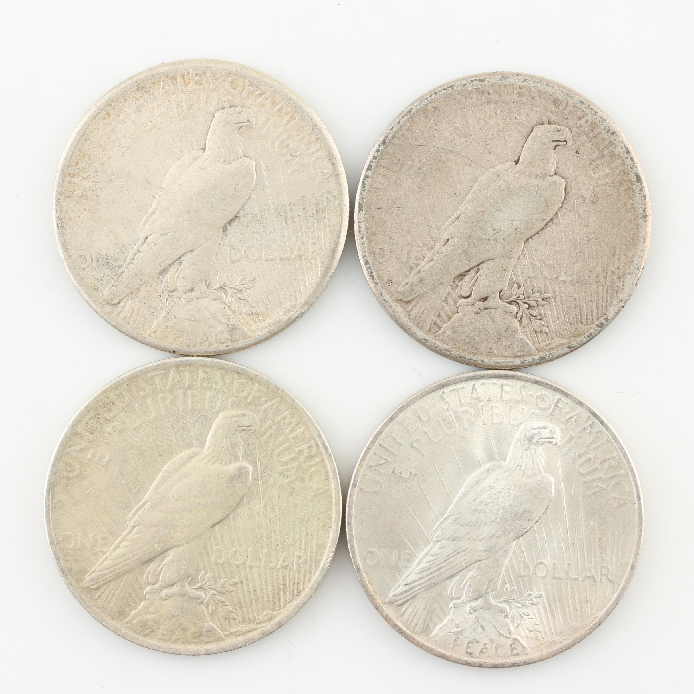 Four Peace Silver Dollars