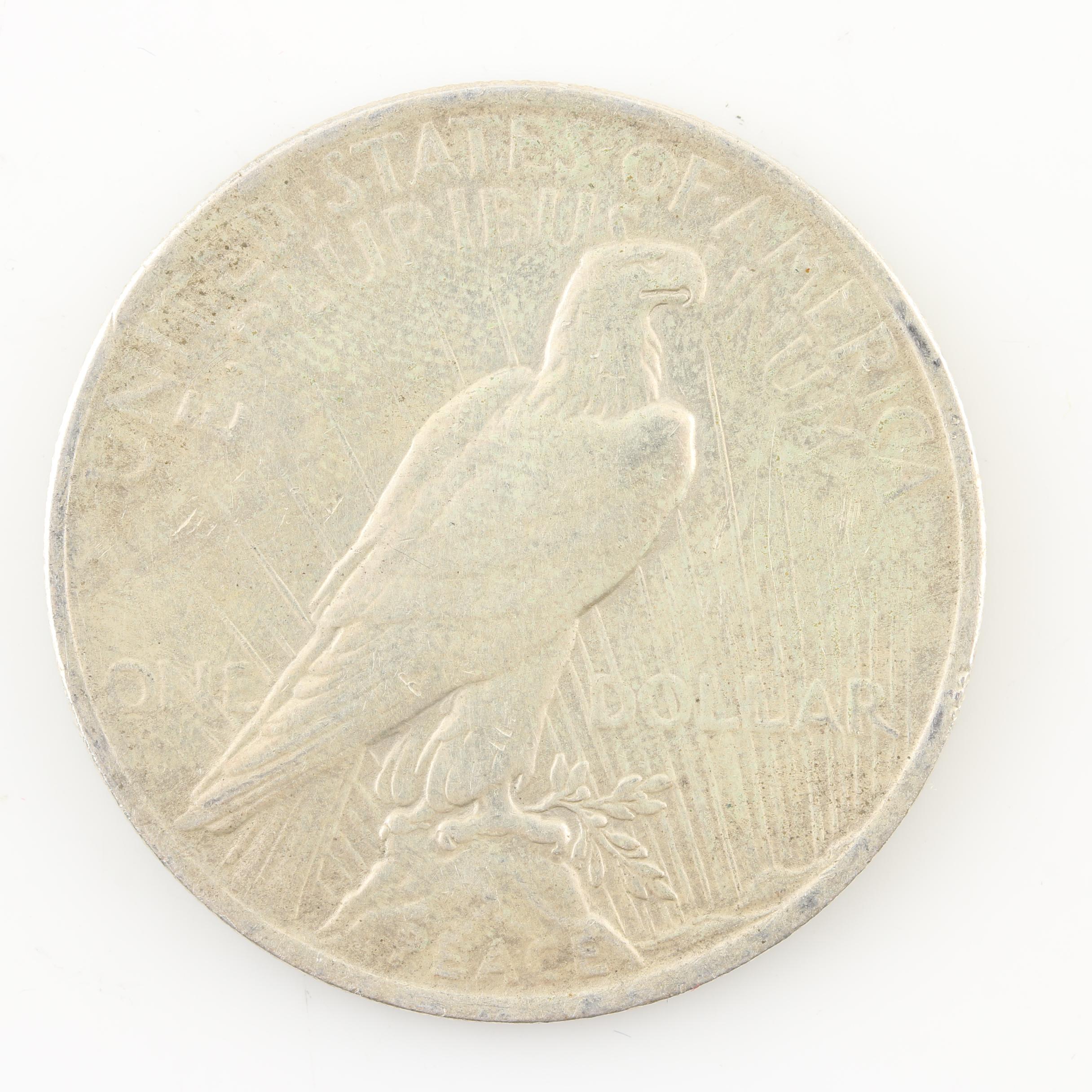 Four Peace Silver Dollars