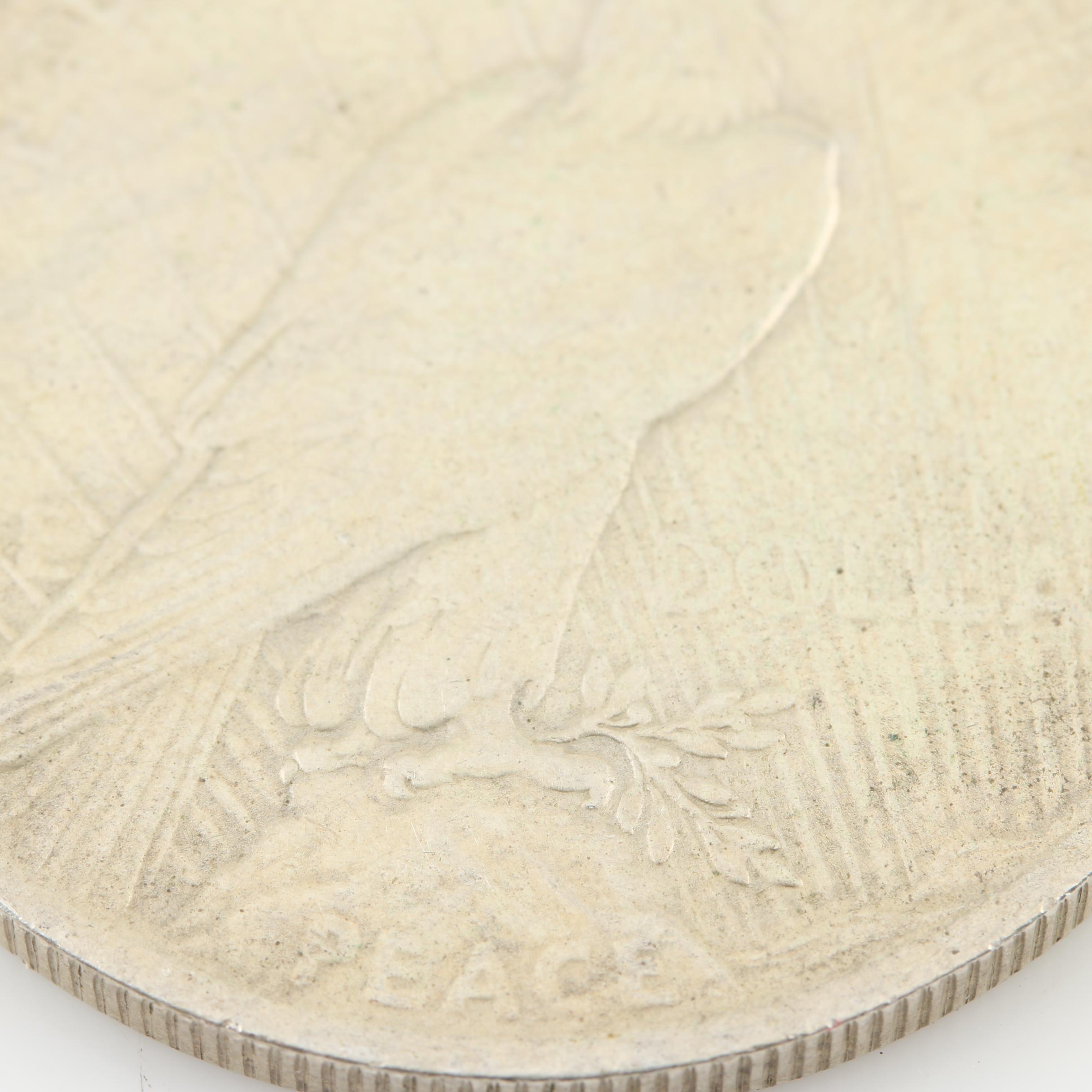 Four Peace Silver Dollars