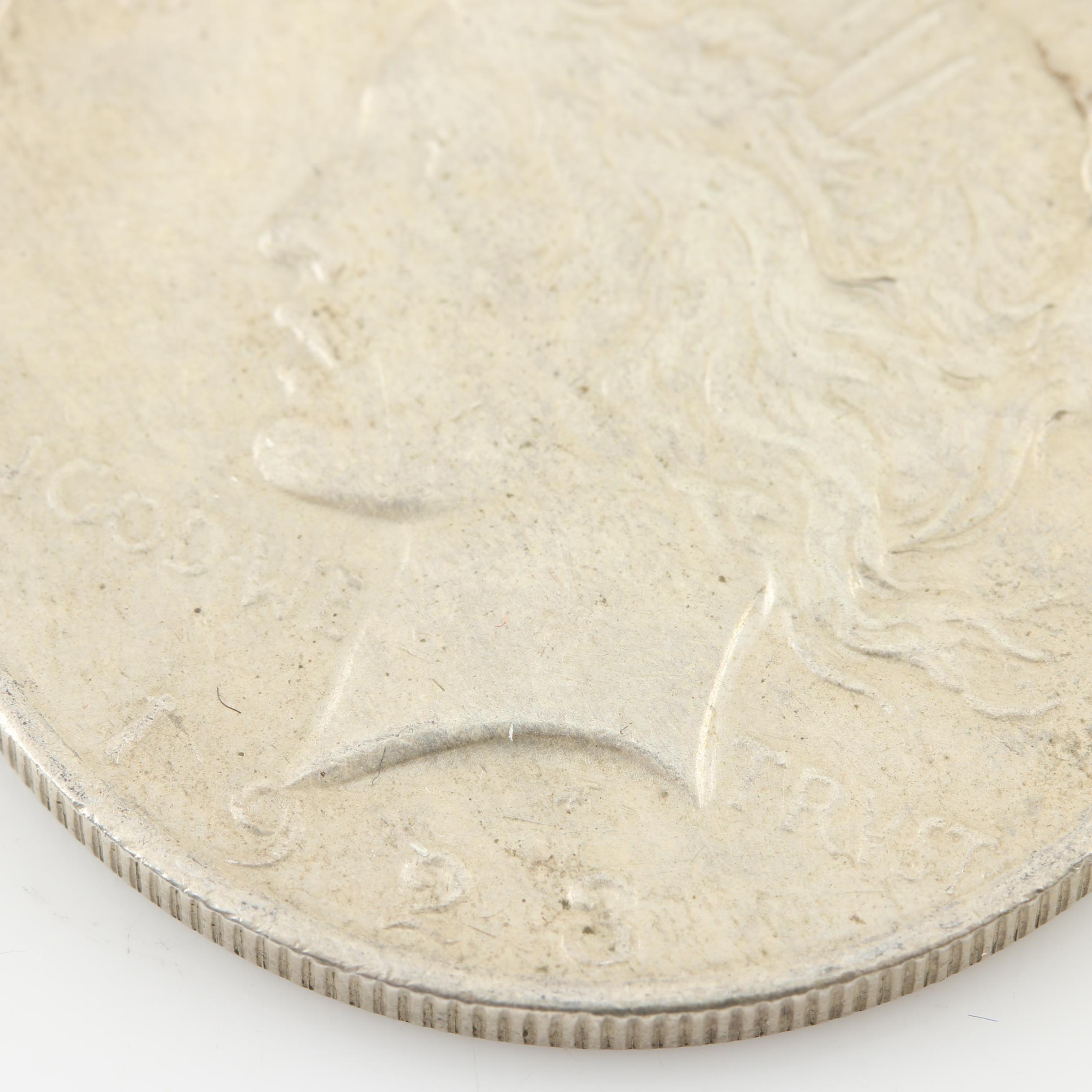 Four Peace Silver Dollars