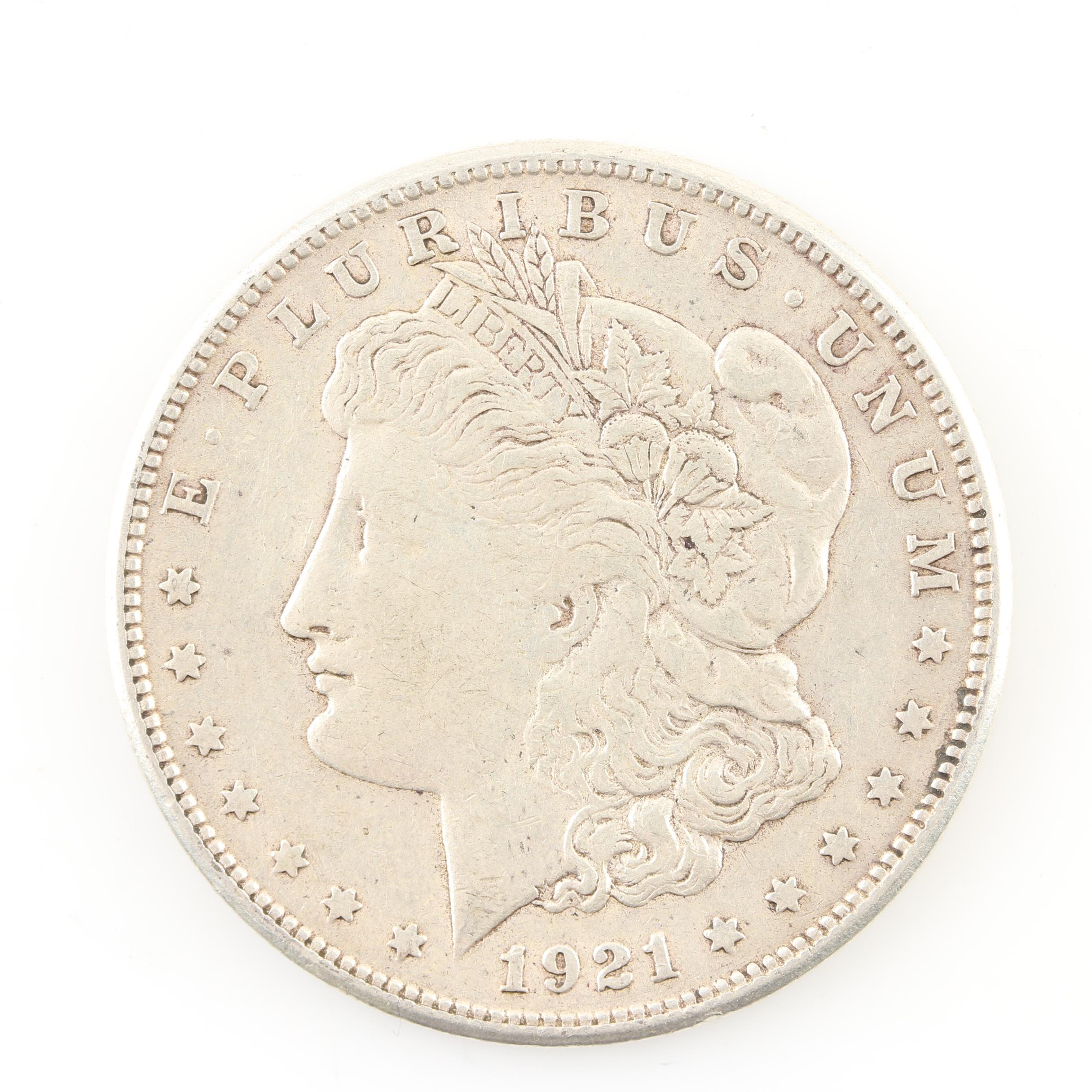 Five Morgan Silver Dollars