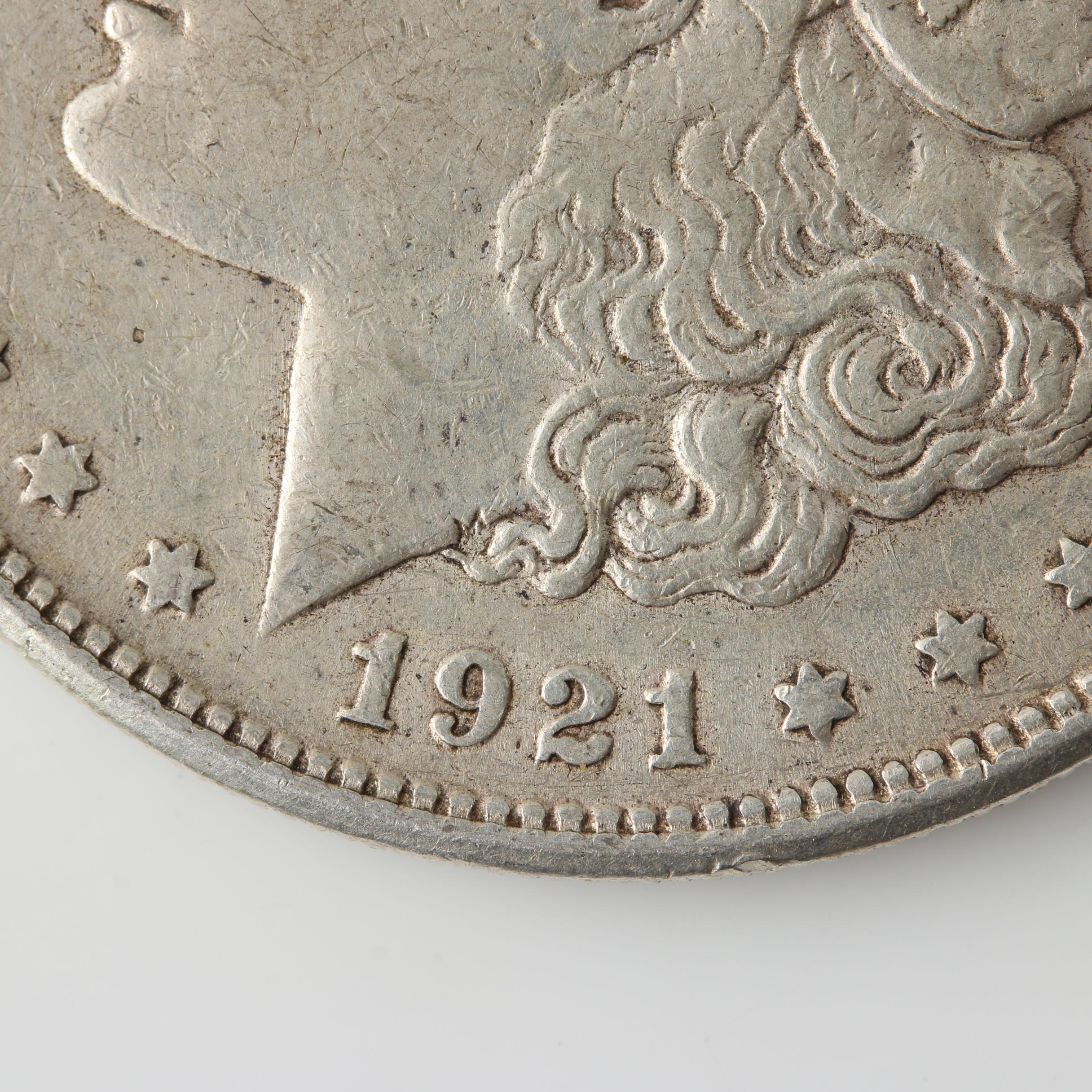 Five Morgan Silver Dollars