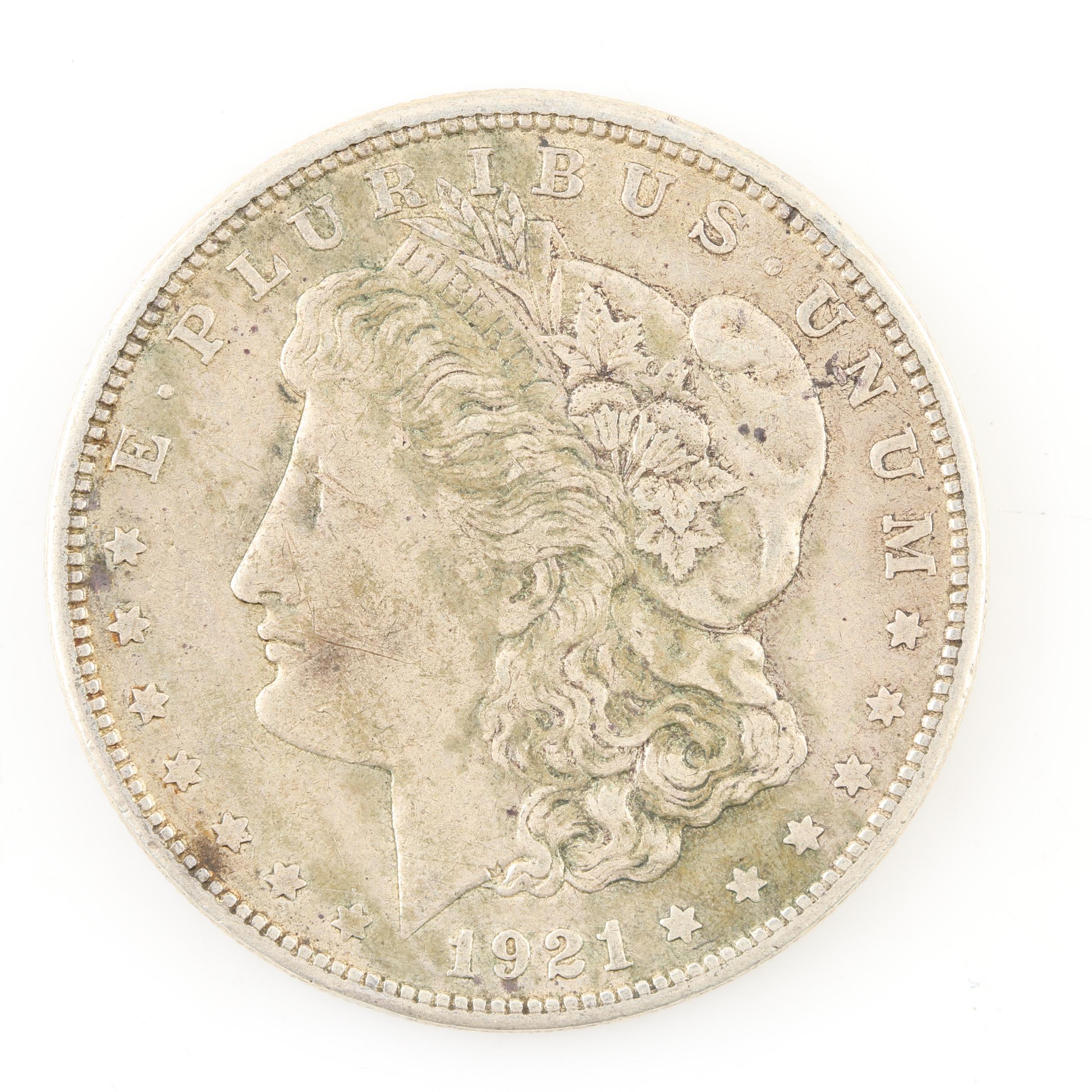 Five Morgan Silver Dollars