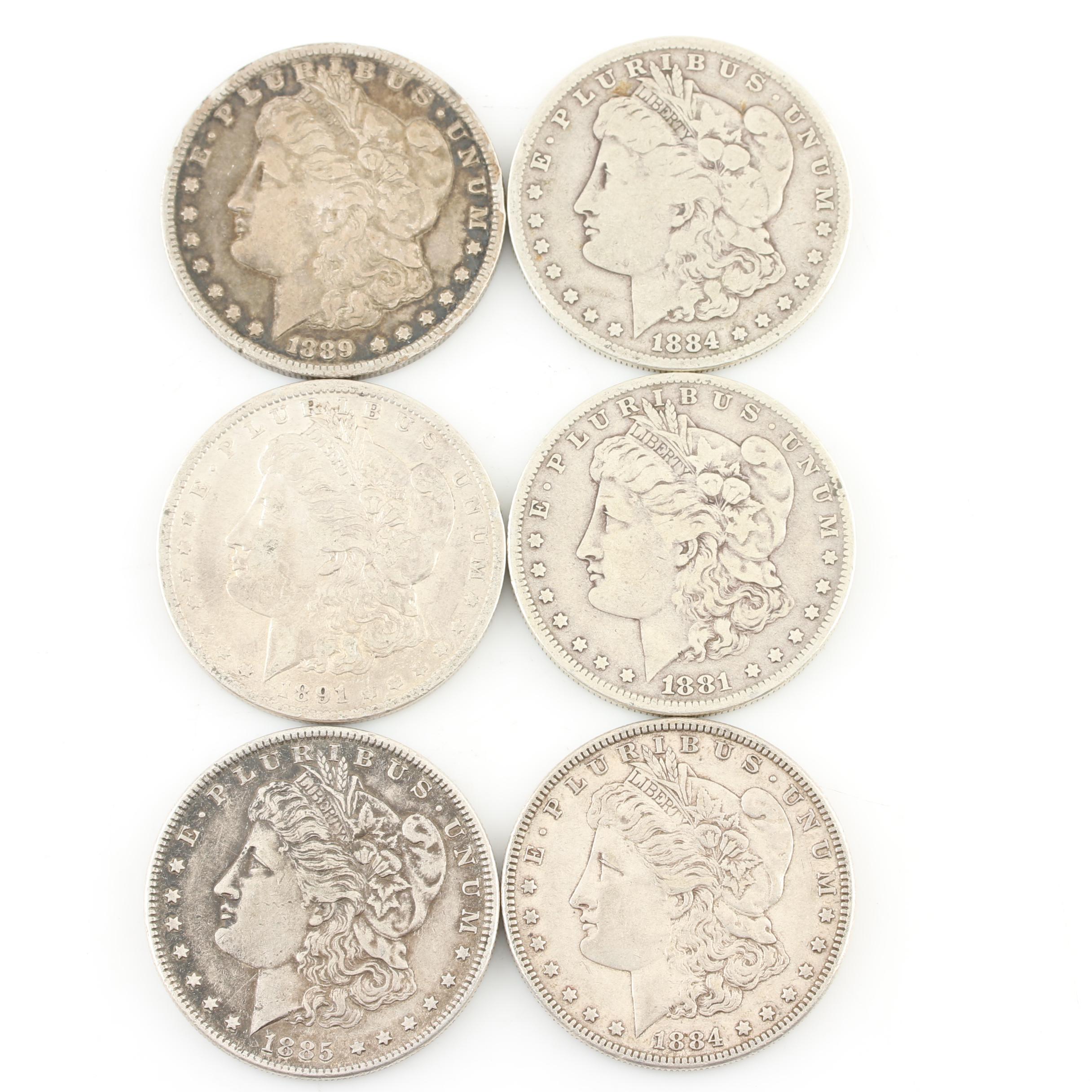 Six Morgan Silver Dollars