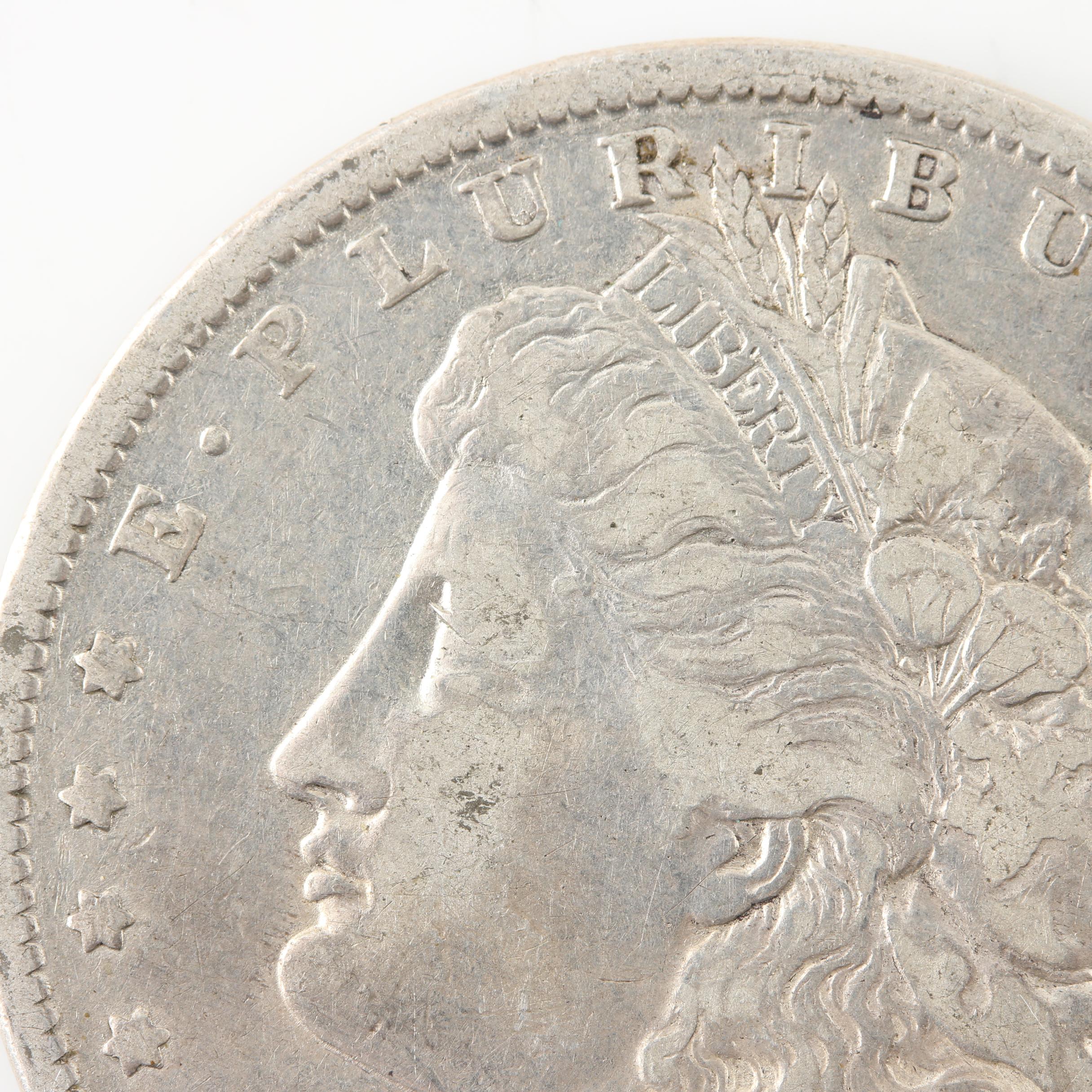 Six Morgan Silver Dollars