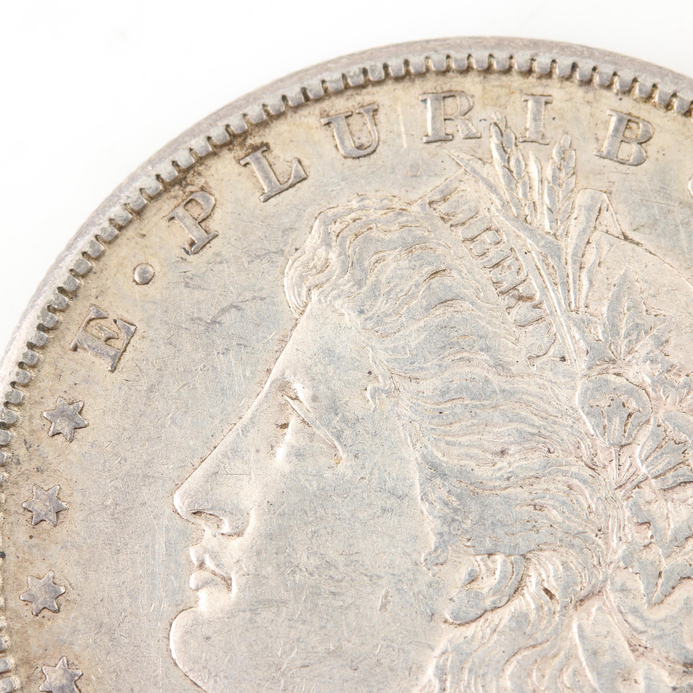 Six Morgan Silver Dollars