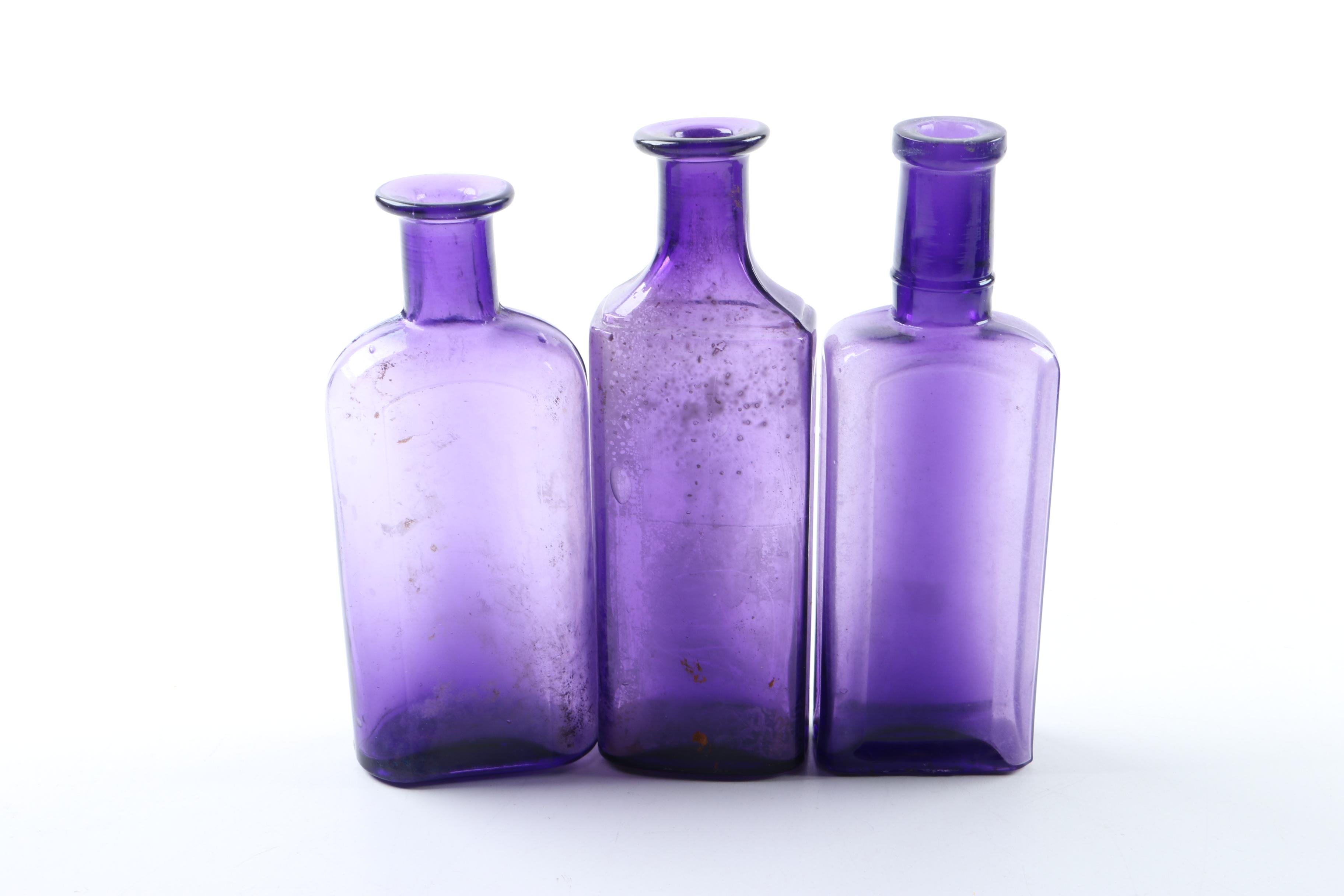 Vintage Purple Glass Apothecary Bottles