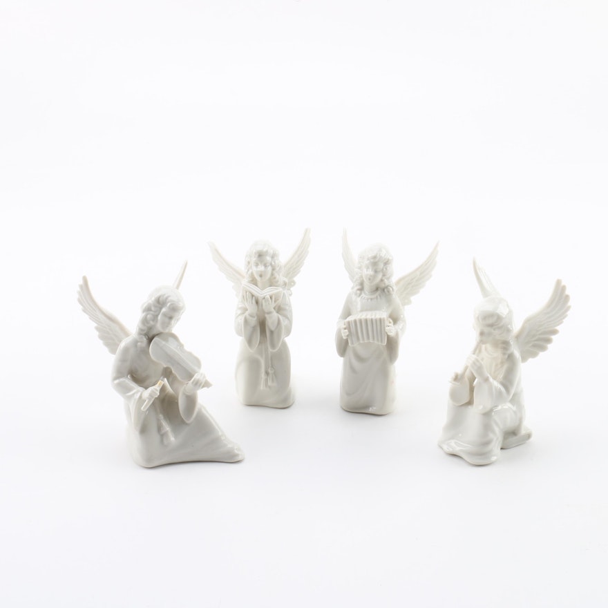 Four White Porcelain Dresden Style Angel Figurines