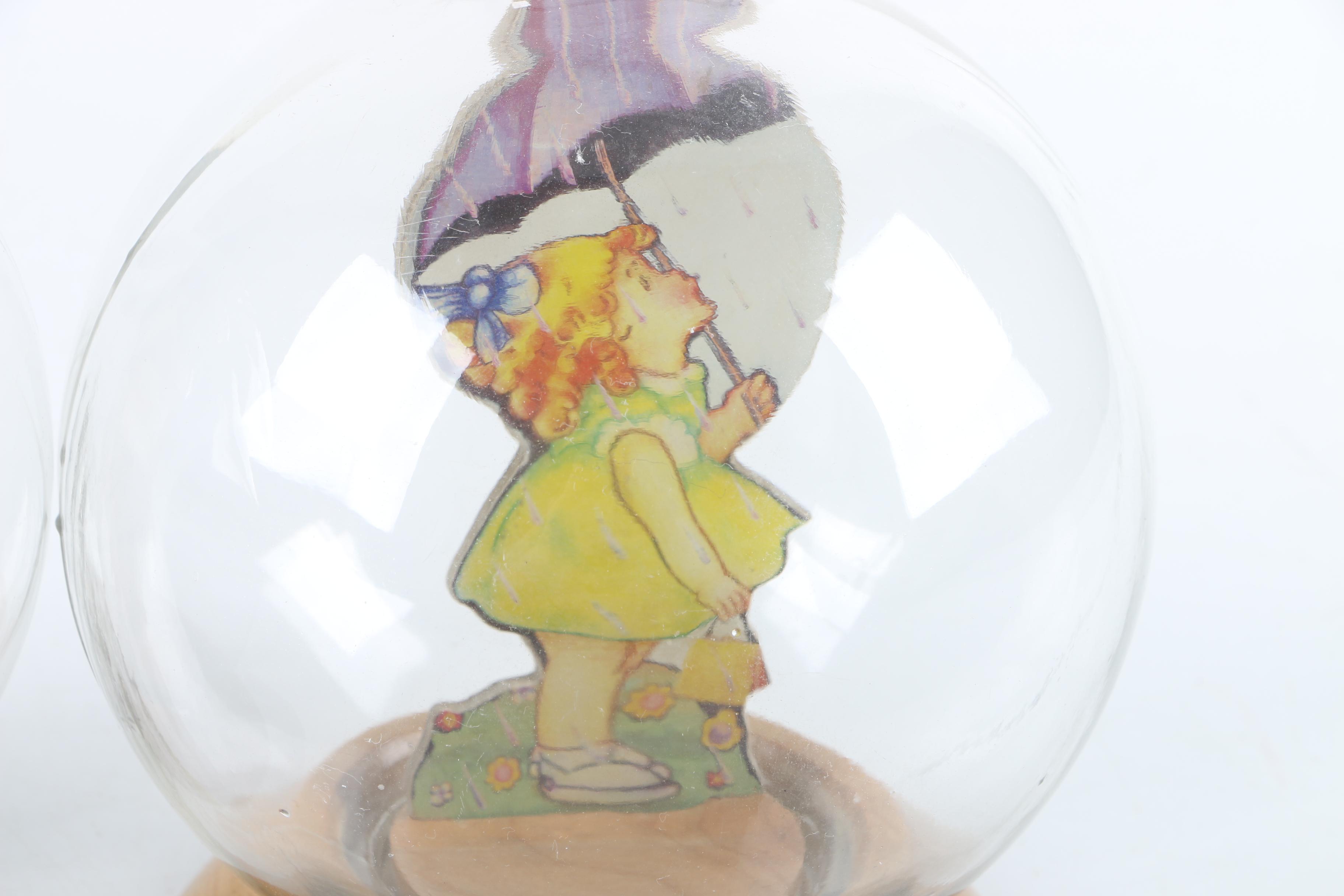 Vintage Glass Novelty Bubble Banks "Monark Pedal Power" and "A Rainy Day"