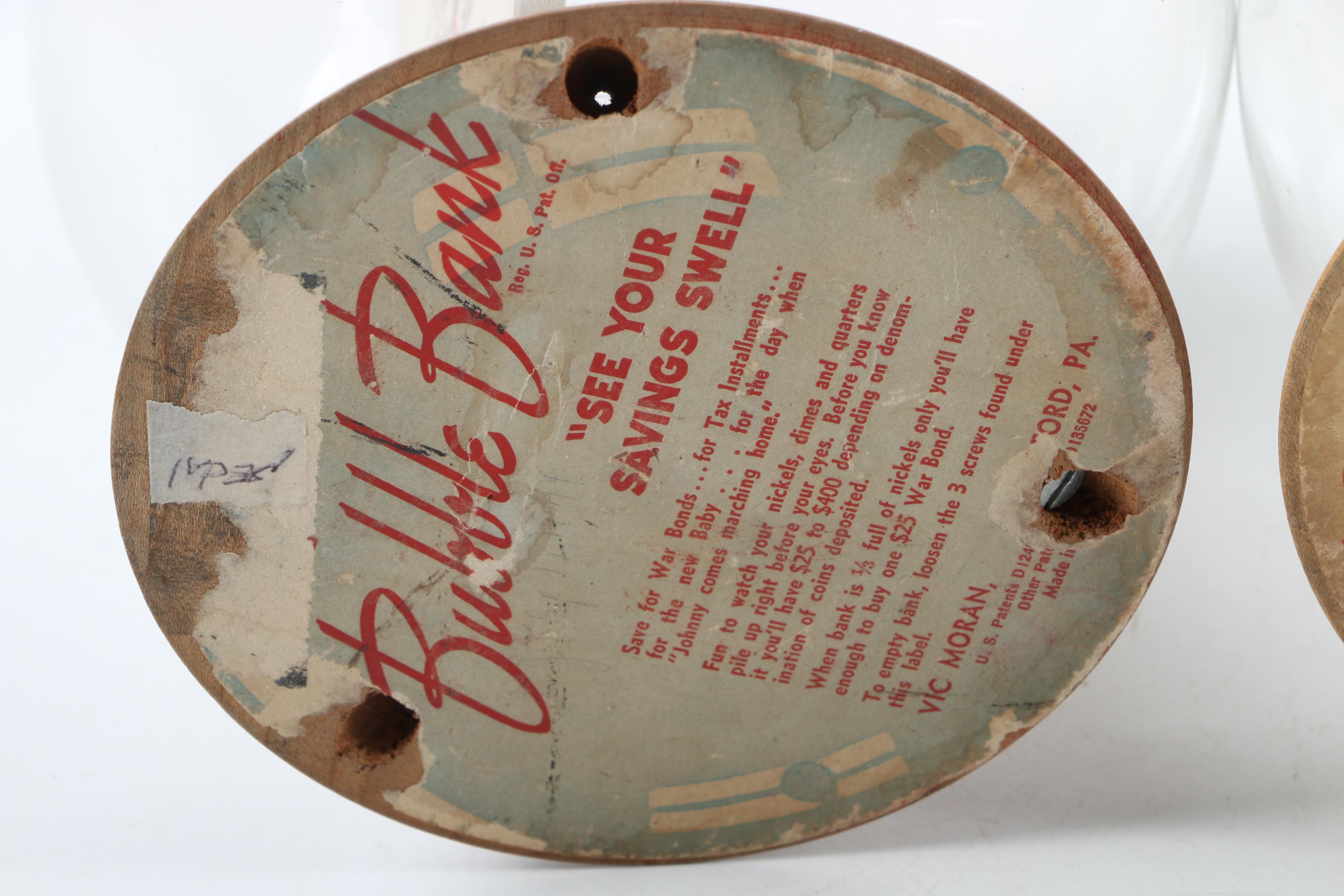 Vintage Glass Novelty Bubble Banks "Monark Pedal Power" and "A Rainy Day"