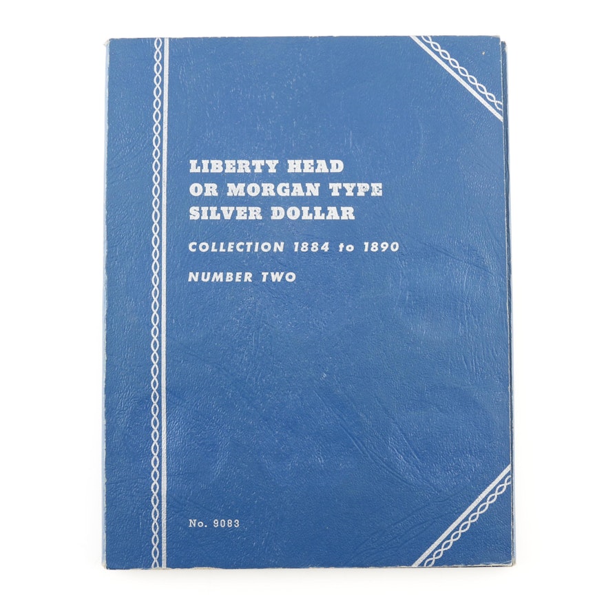 Group of 25 Silver Morgan Dollars in a Whitman Folder