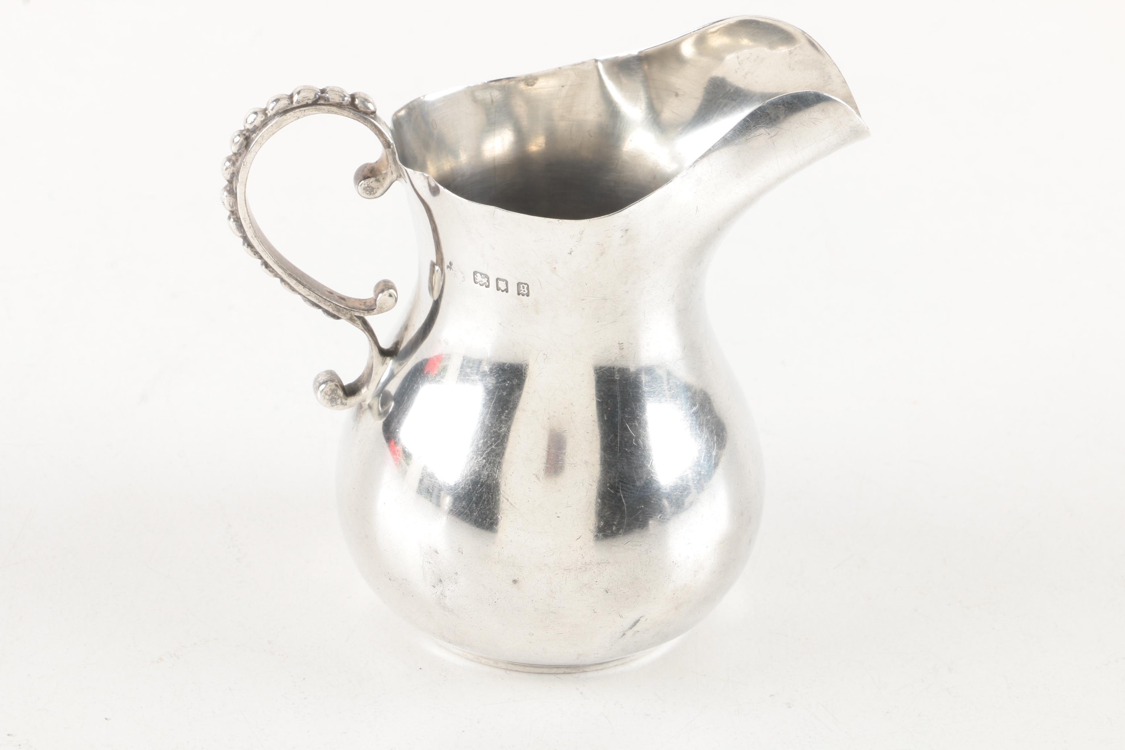 1922 London Sterling Silver Creamer and Frank M Whiting Sterling Silver Creamer