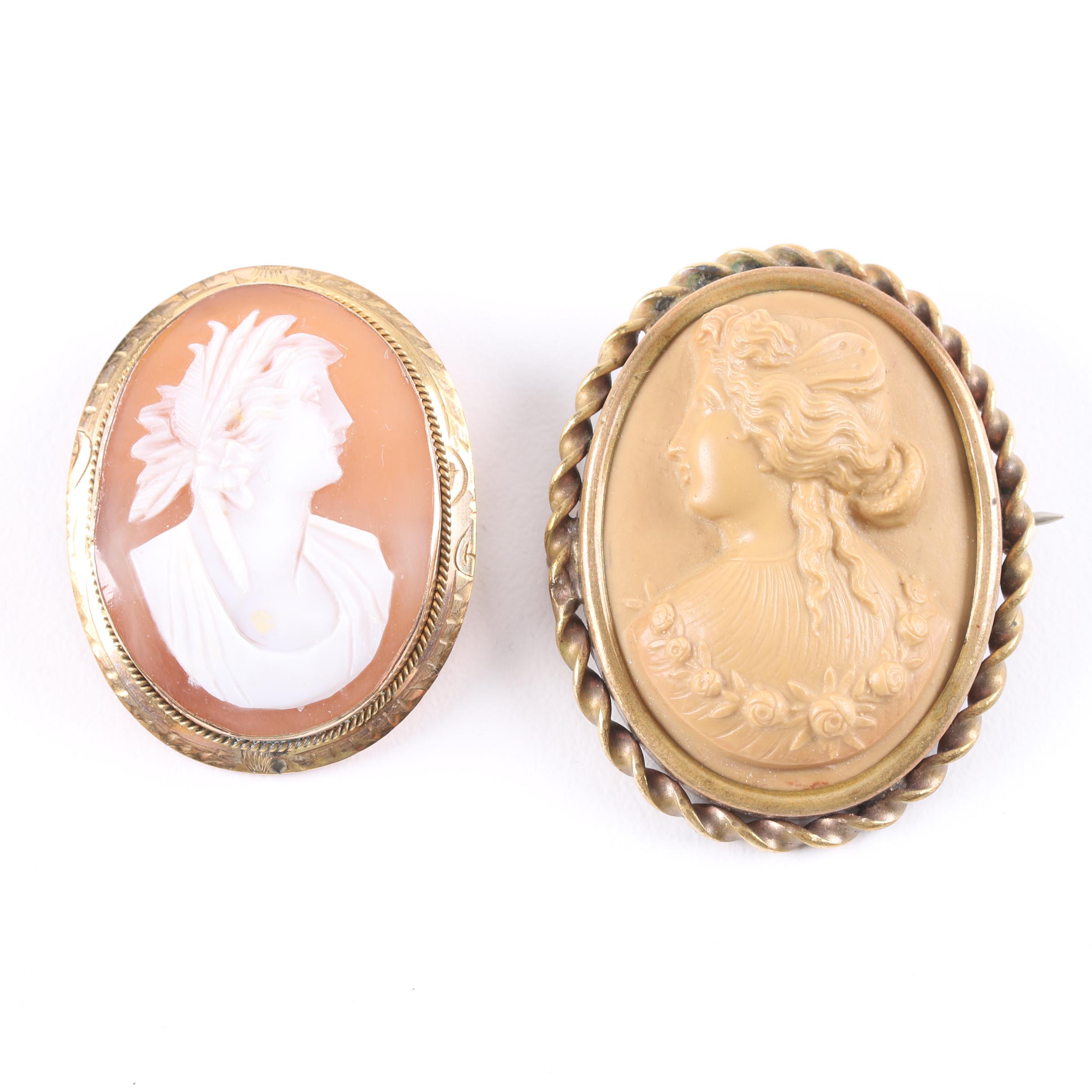 Helmet Shell and Lava Carved Cameo Brooches