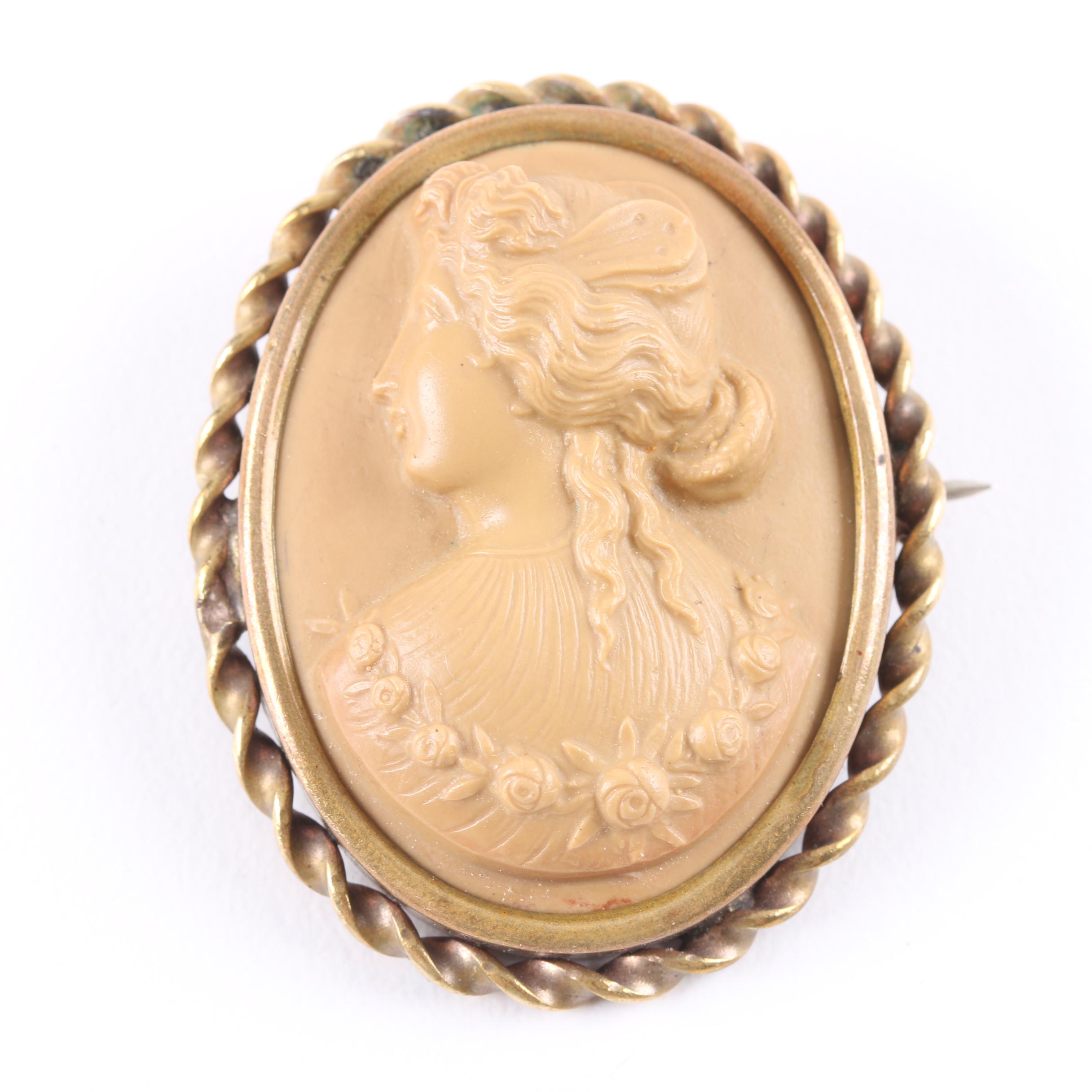 Helmet Shell and Lava Carved Cameo Brooches