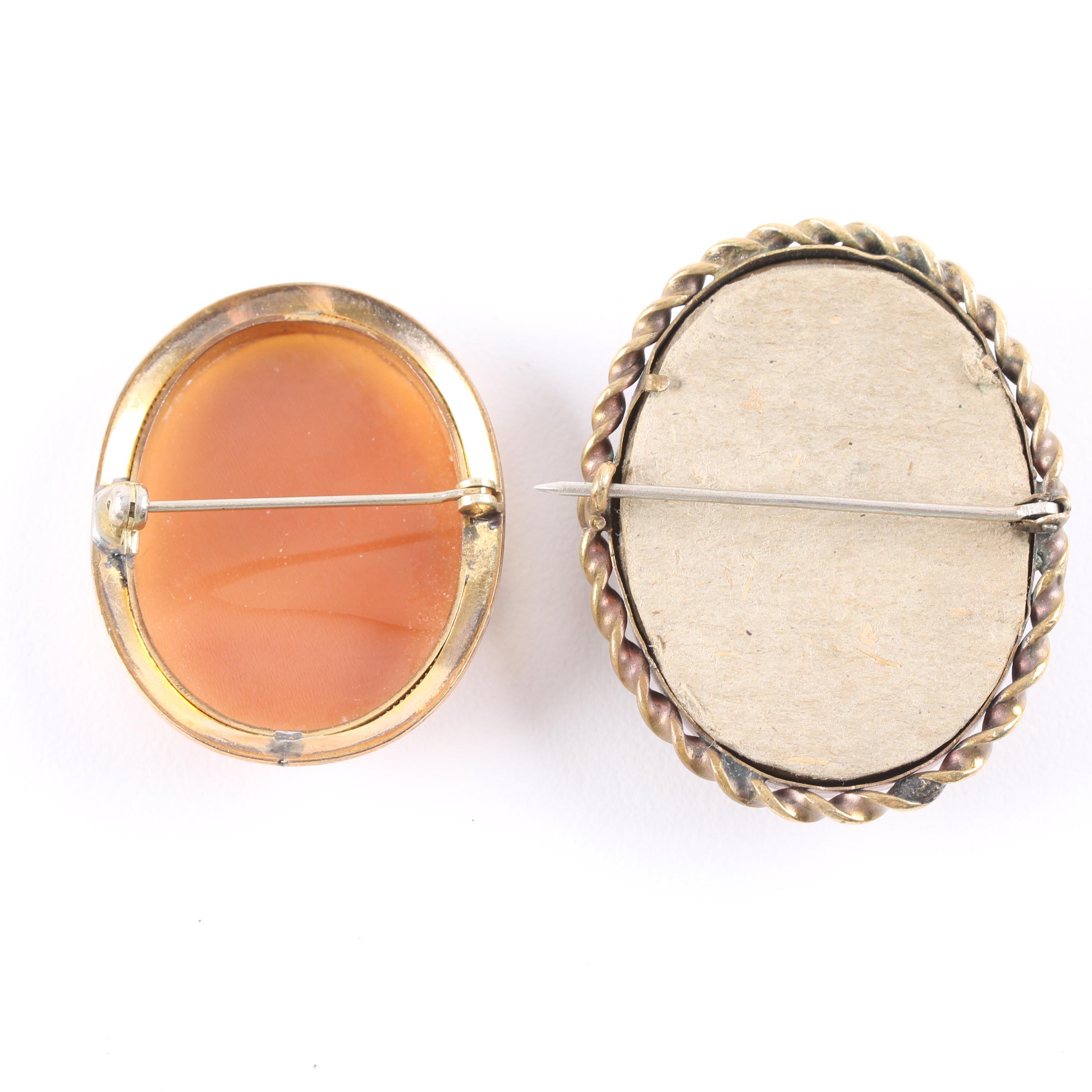 Helmet Shell and Lava Carved Cameo Brooches