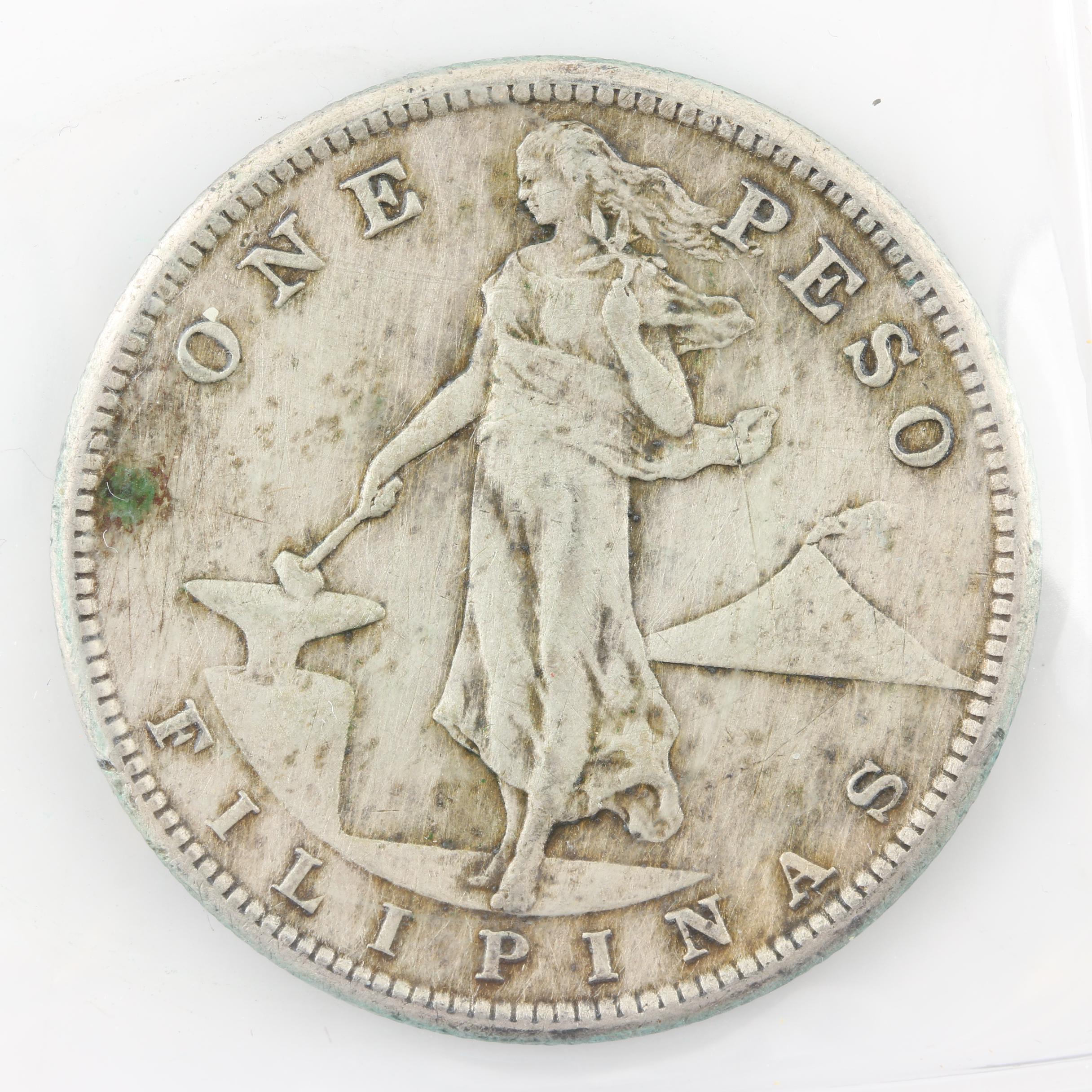 Two Antique 1-Peso Silver Coins from the Philippines