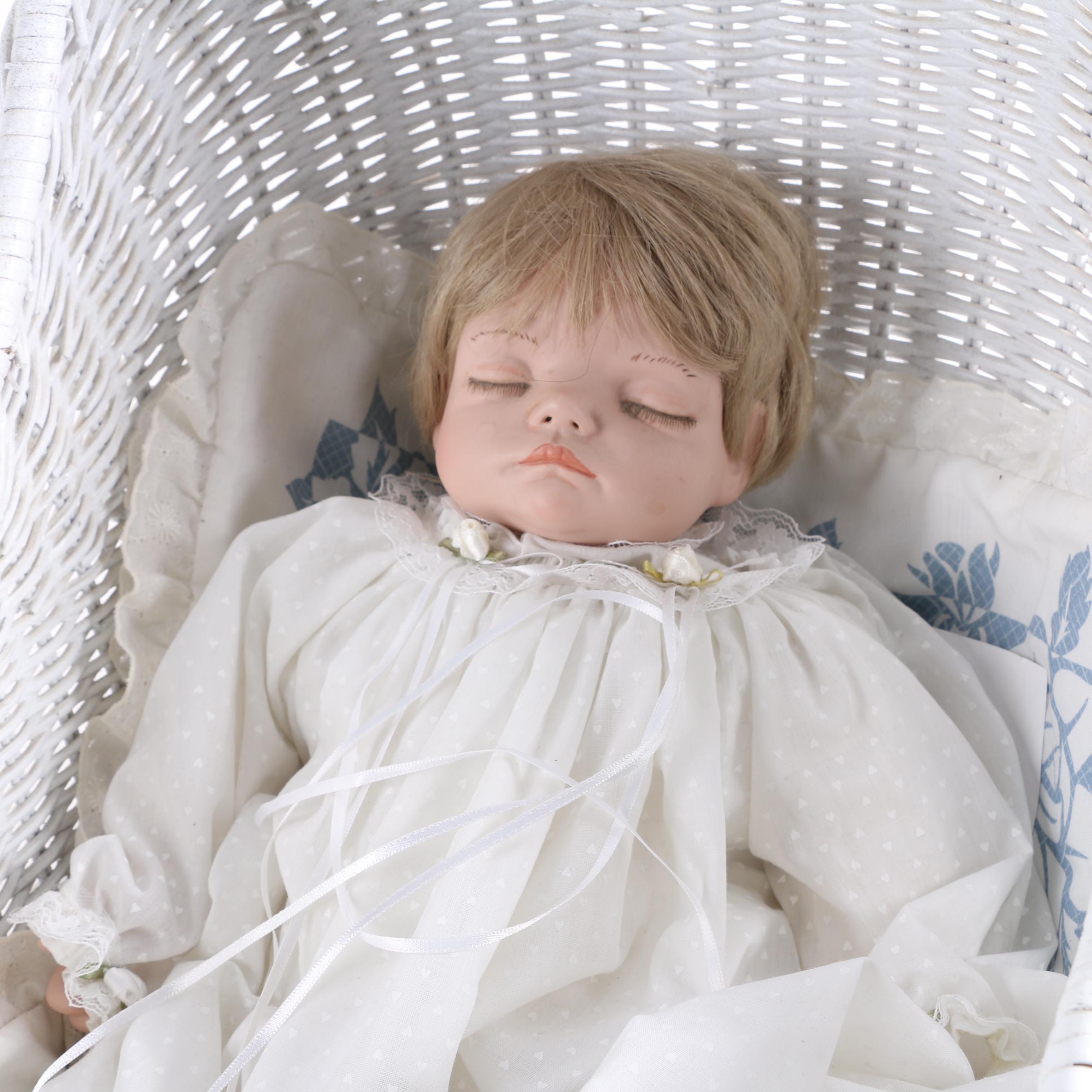Porcelain Baby Doll in White Wicker Pram