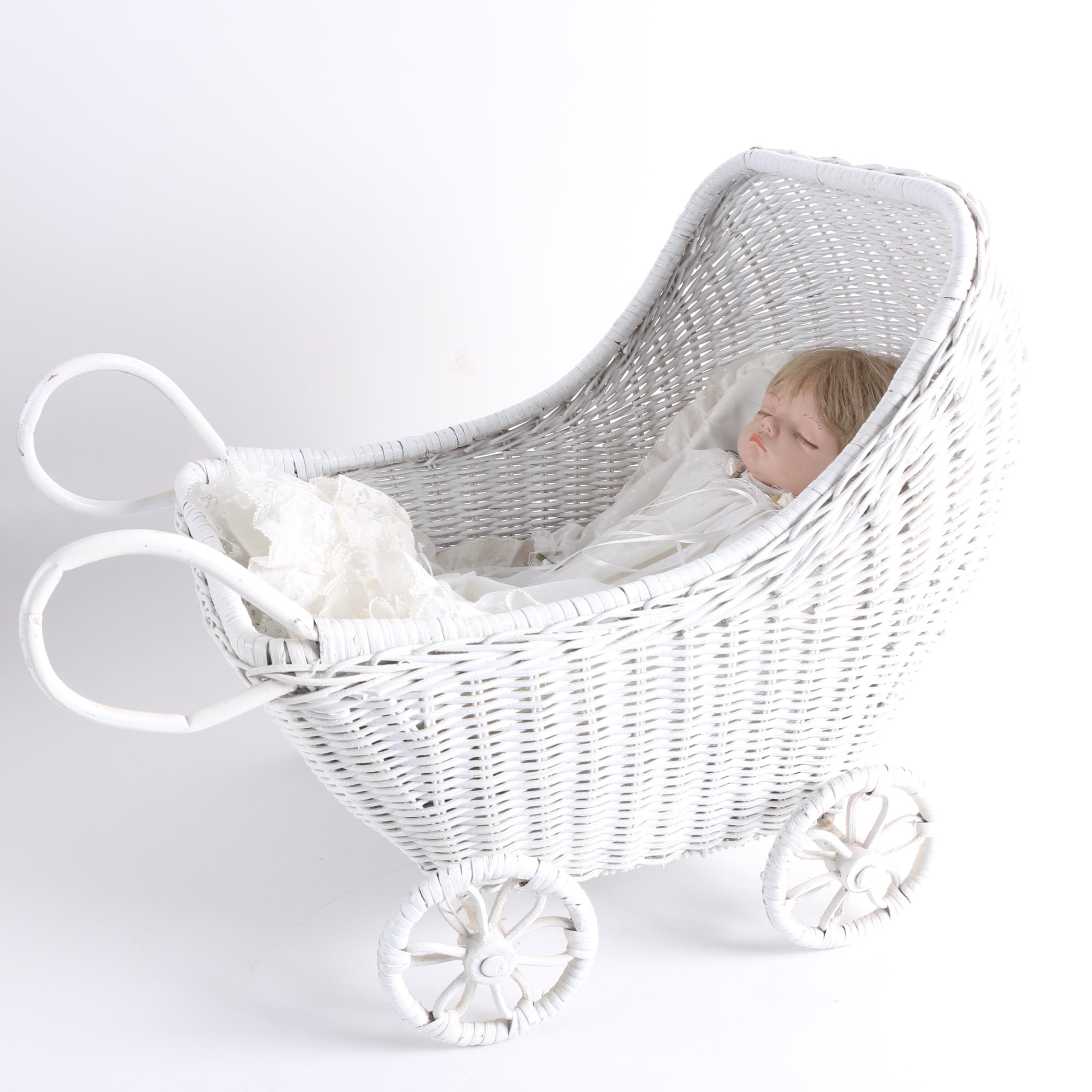 Porcelain Baby Doll in White Wicker Pram