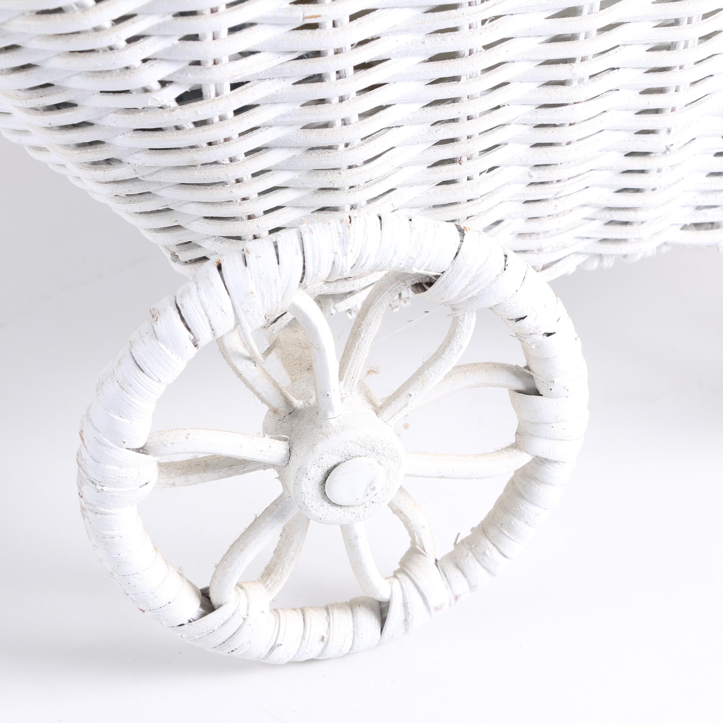 Porcelain Baby Doll in White Wicker Pram