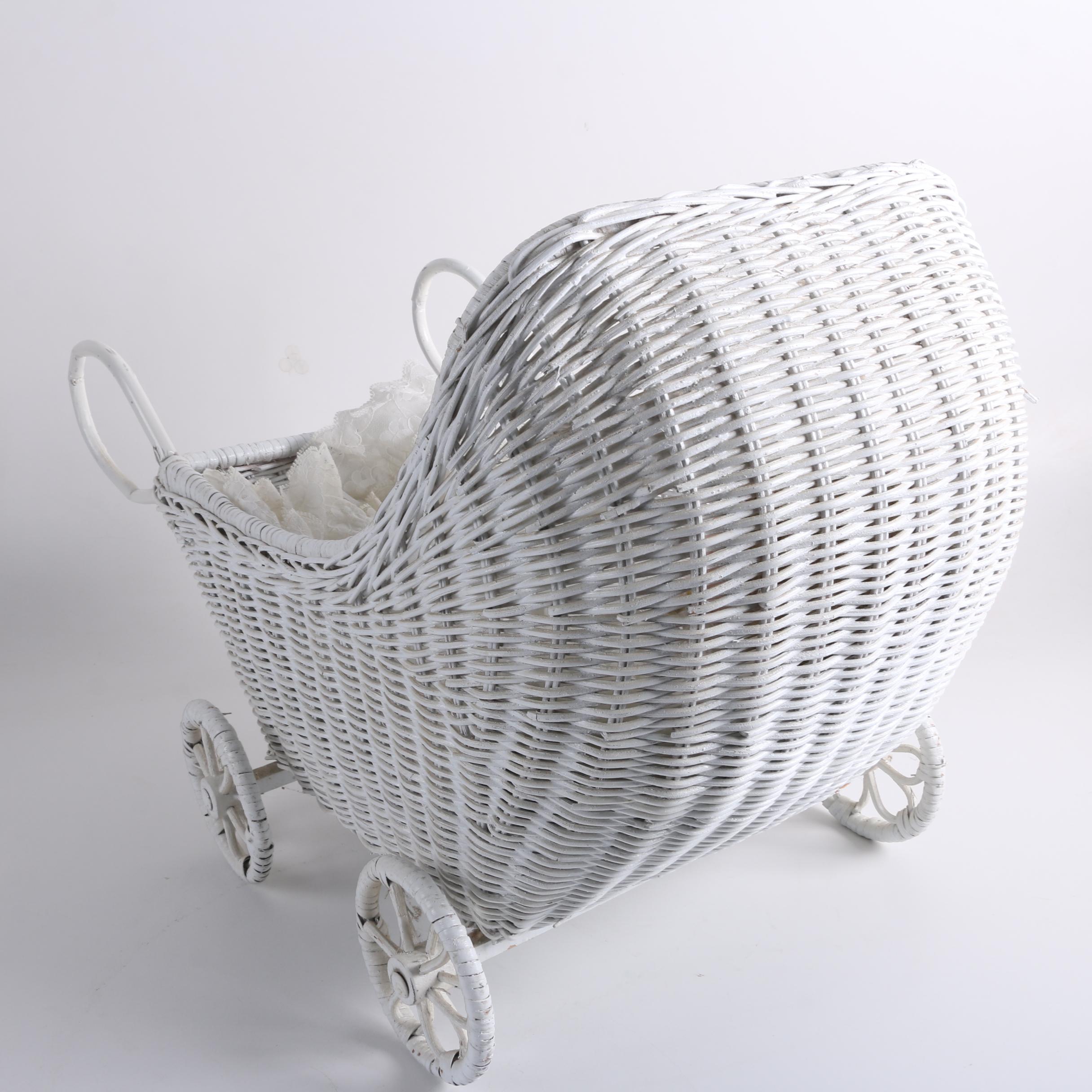 Porcelain Baby Doll in White Wicker Pram