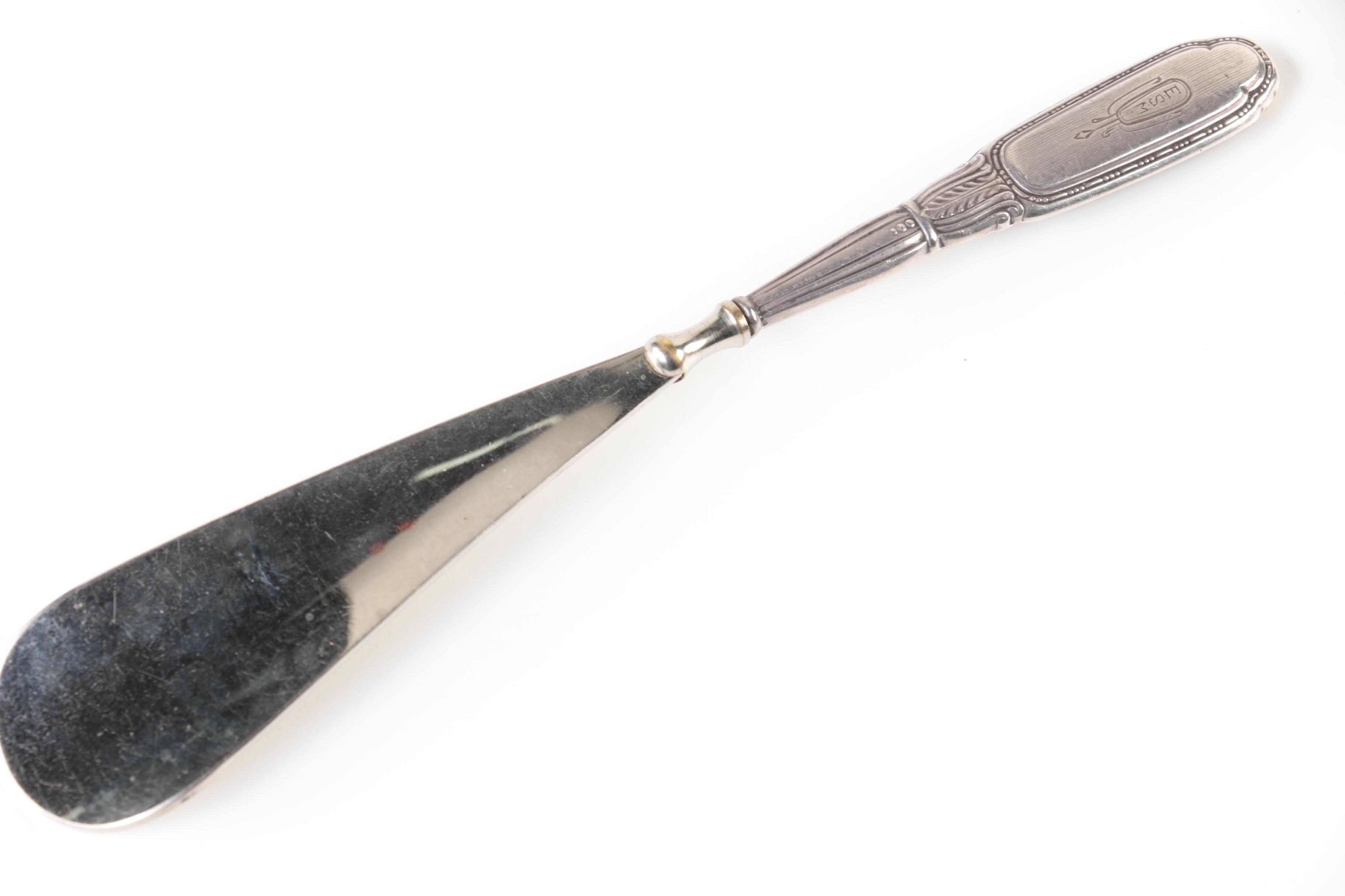 Sterling, Brass, and Wood Shoehorn Collection