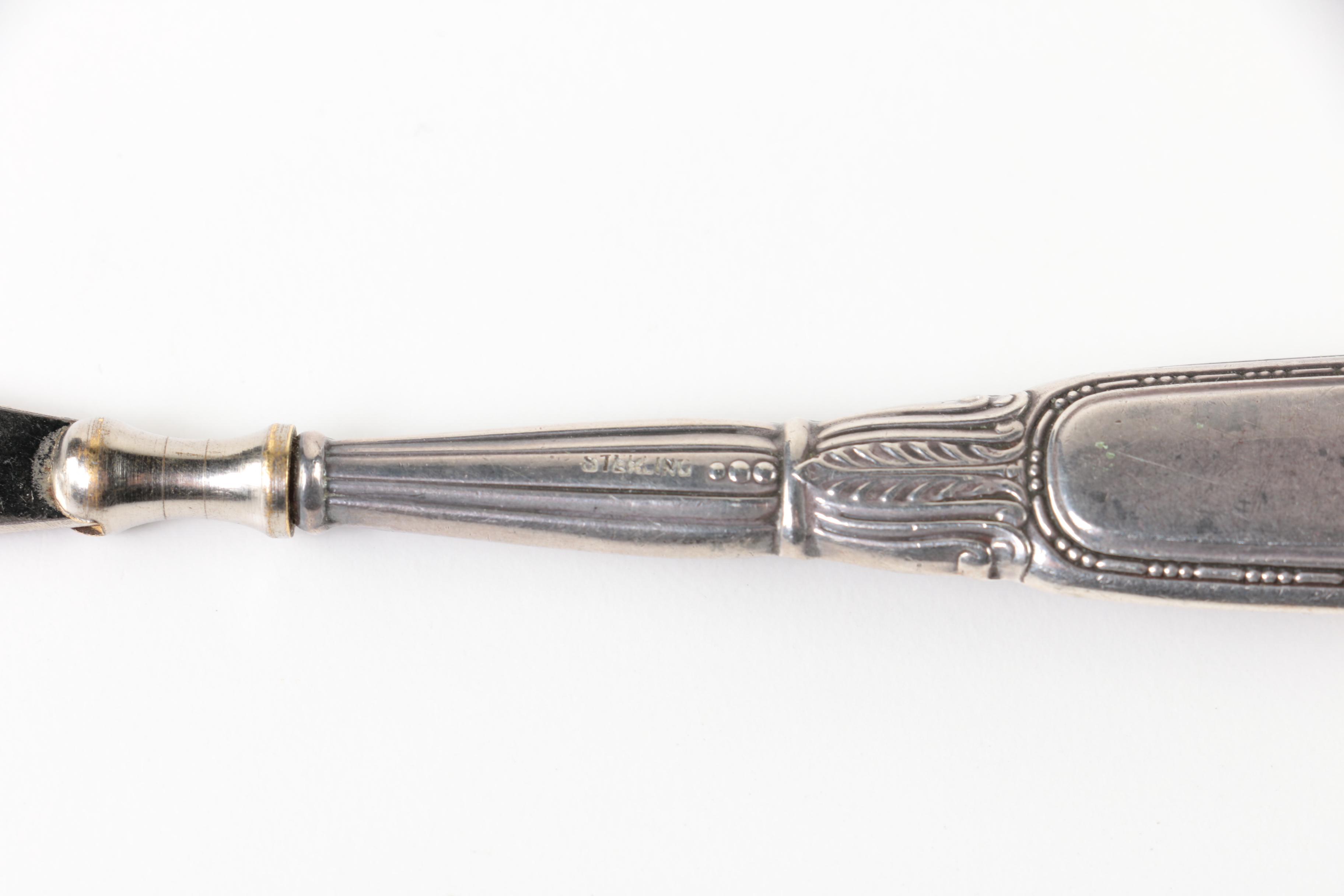 Sterling, Brass, and Wood Shoehorn Collection