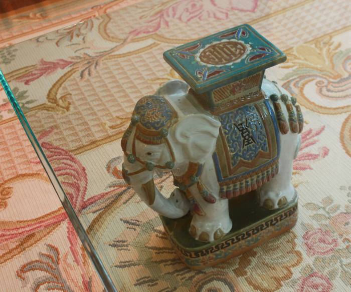Glass Top Coffee Table with Ceramic Elephant Supports