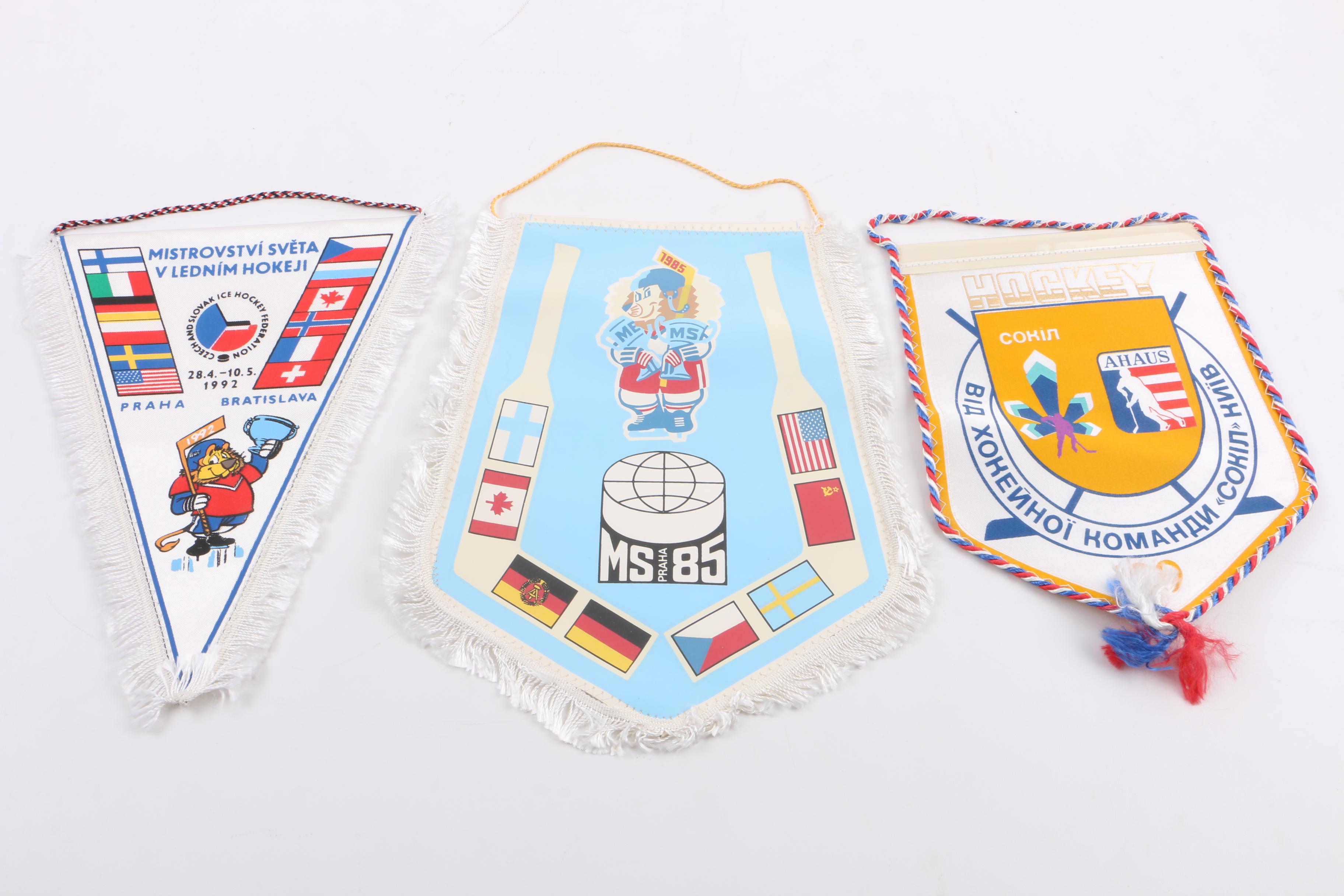 Collection of Eight Vintage International Hockey Tournament Pennants