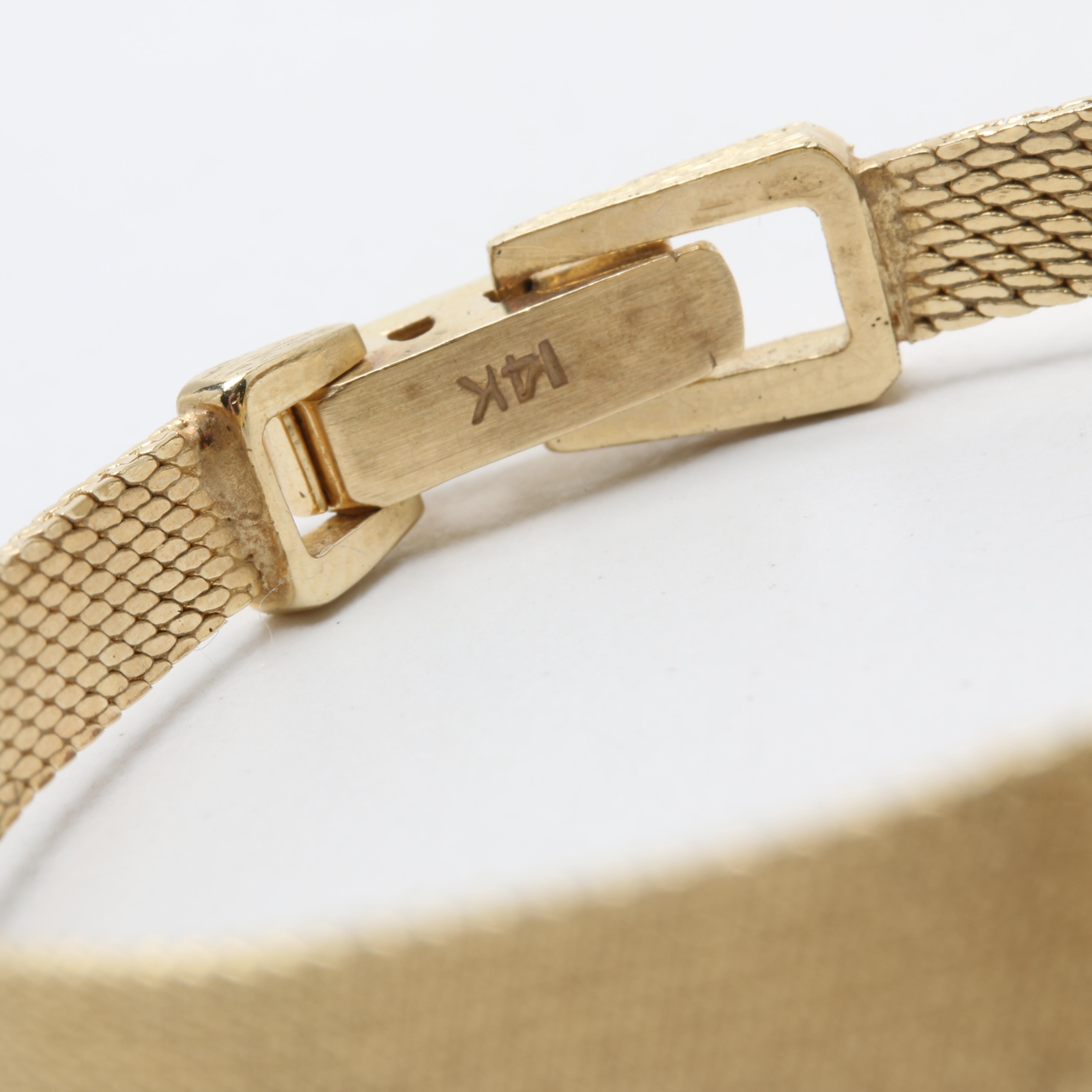 Vintage Geneva Quartz 14K Yellow Gold and Diamond Bezel Watch