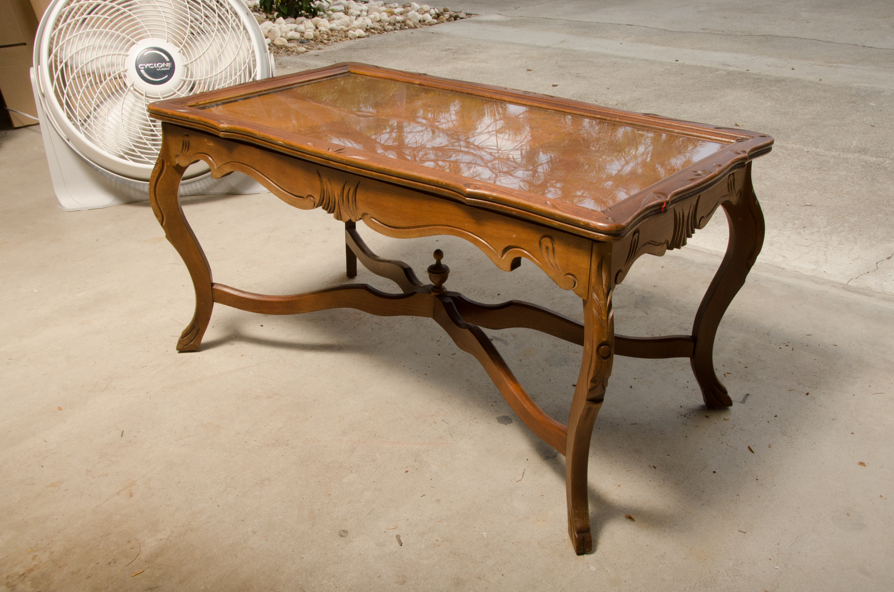 Carved Wooden Coffee Table with Inlaid Glass Top