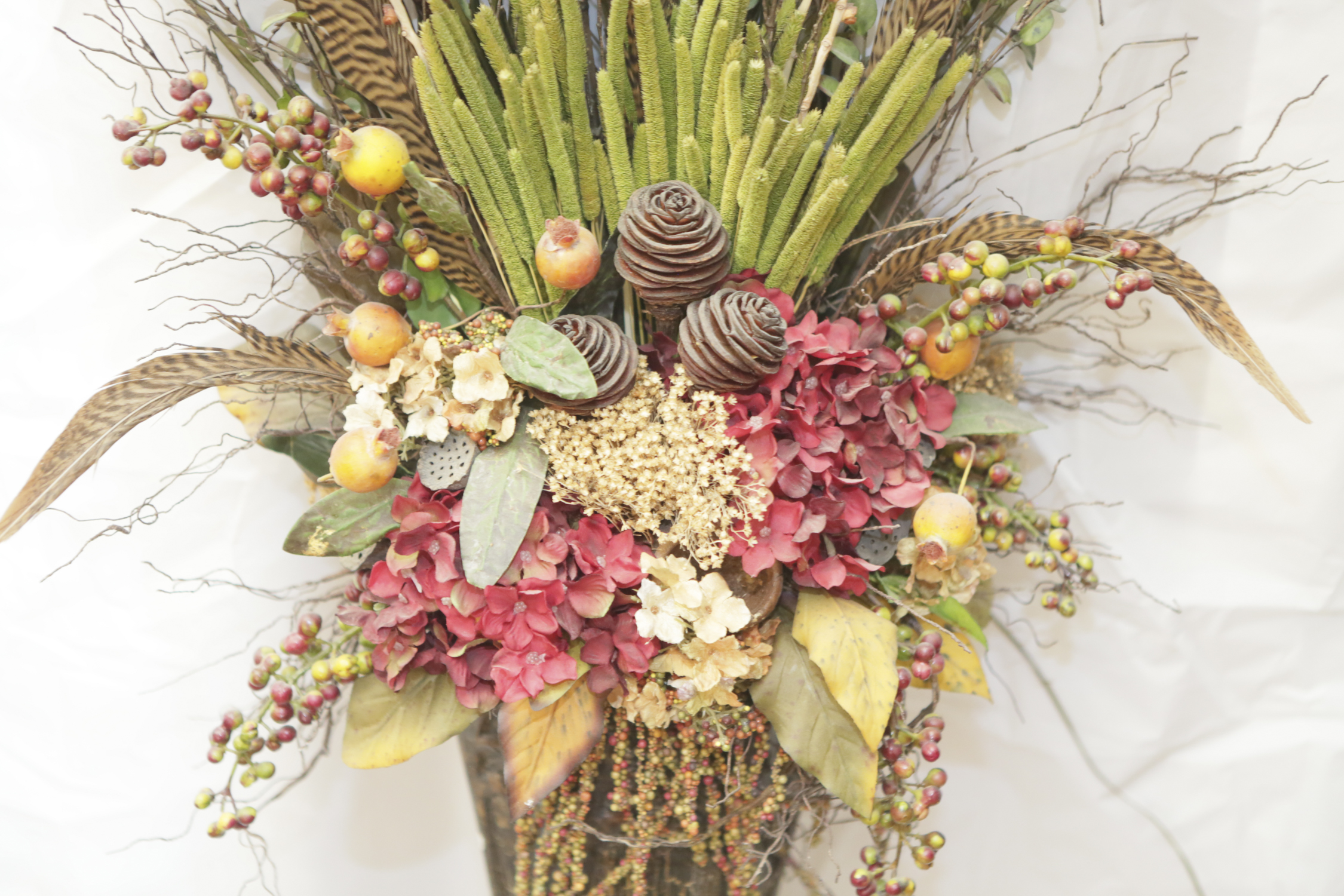 Artificial Flower and Feather Arrangement in Wall Pocket