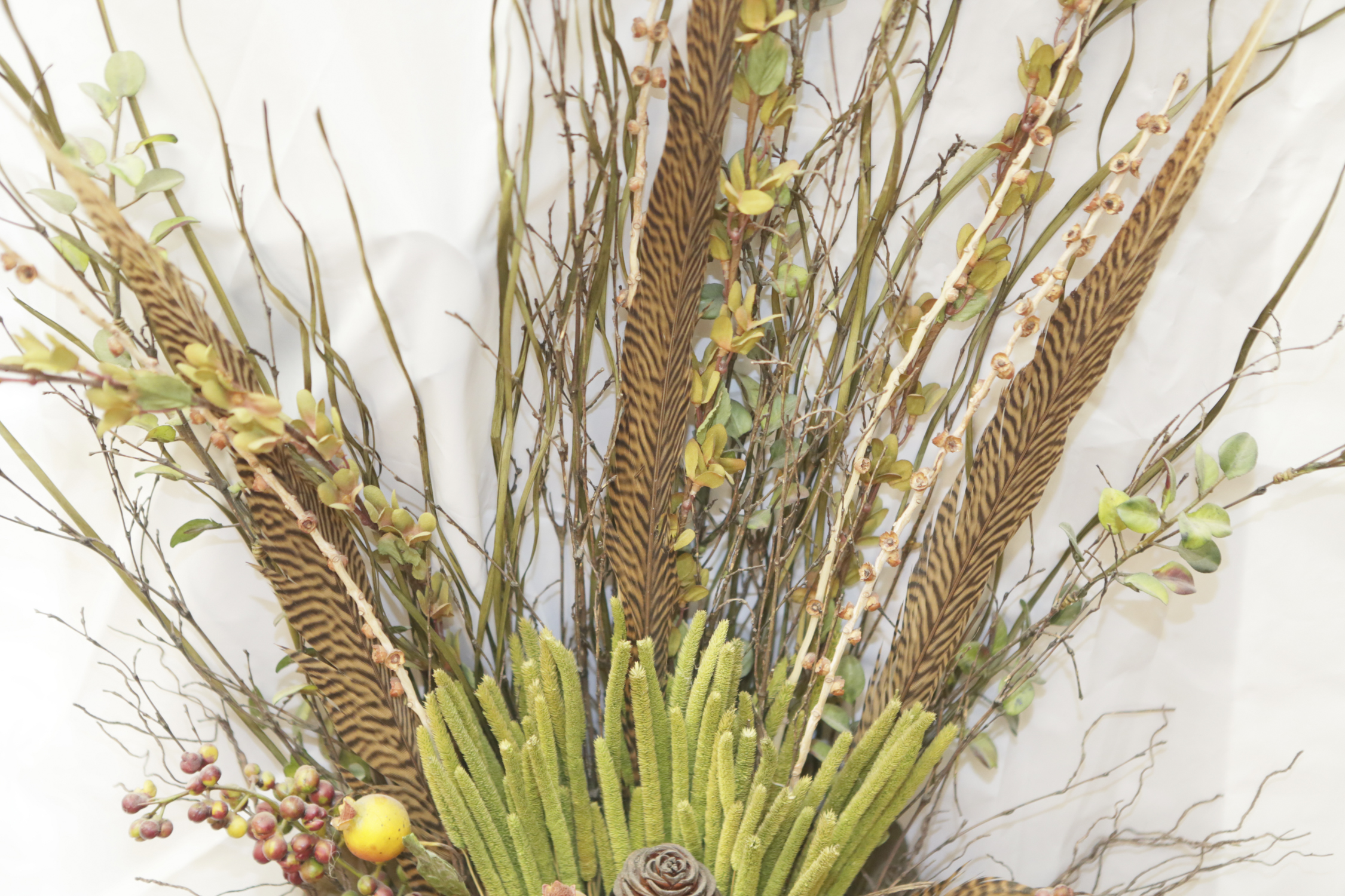 Artificial Flower and Feather Arrangement in Wall Pocket
