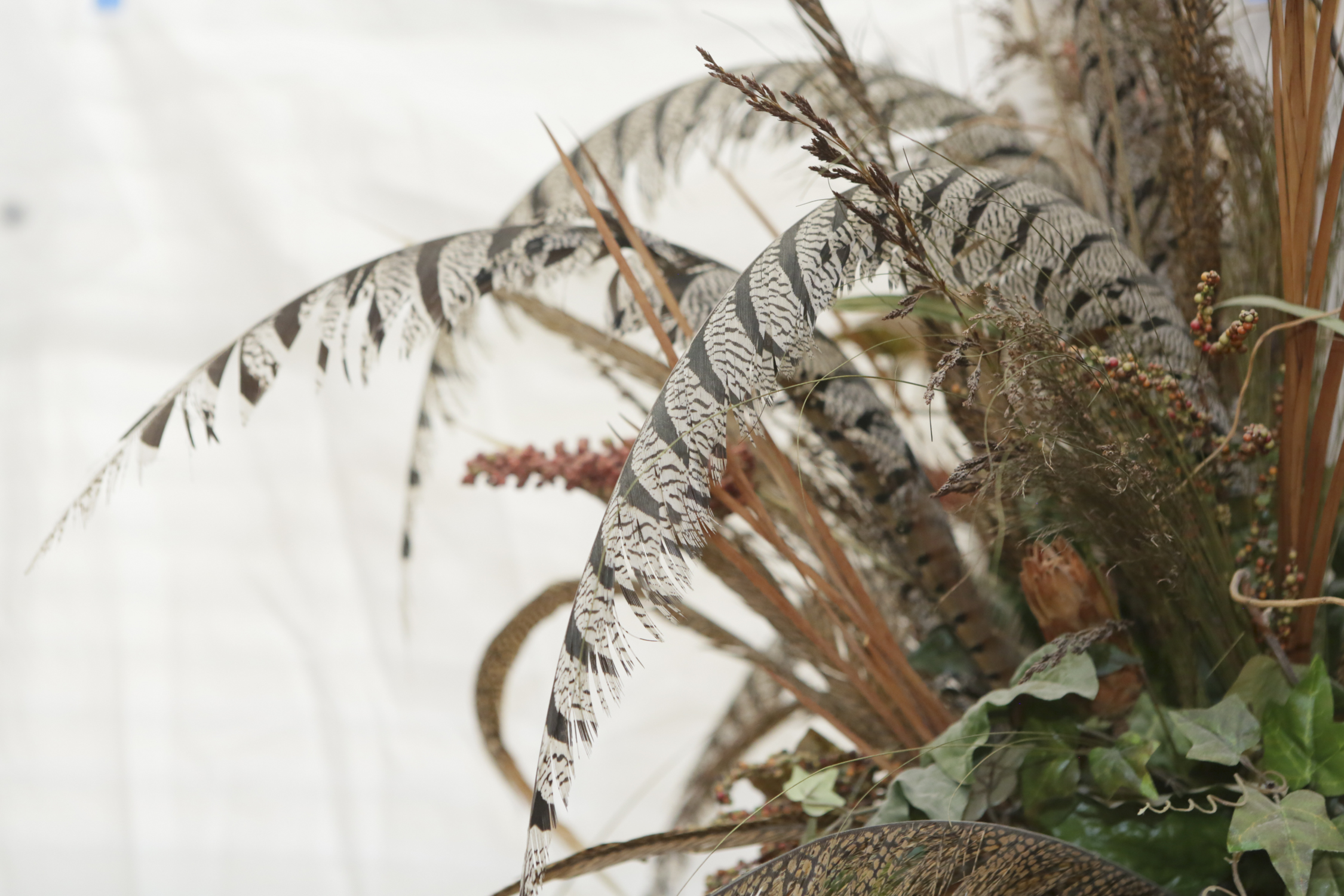 Faux Foliage with Feathers and Metal Stand