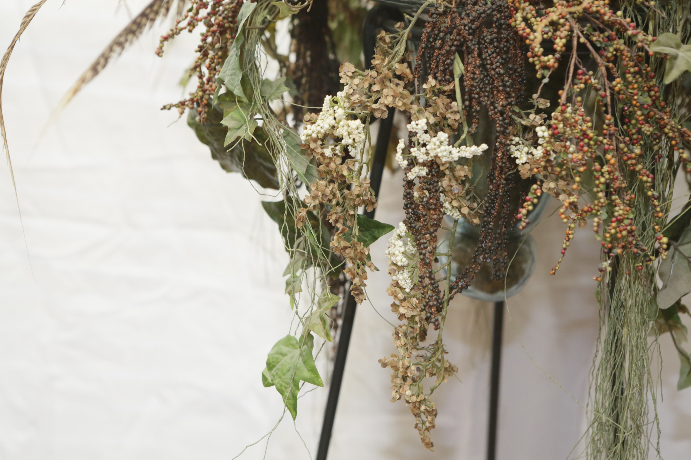 Faux Foliage with Feathers and Metal Stand