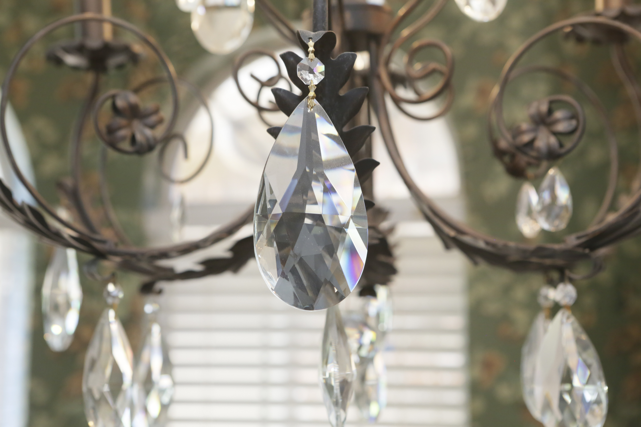 Patinaed Metal and Crystal Six Light Chandelier