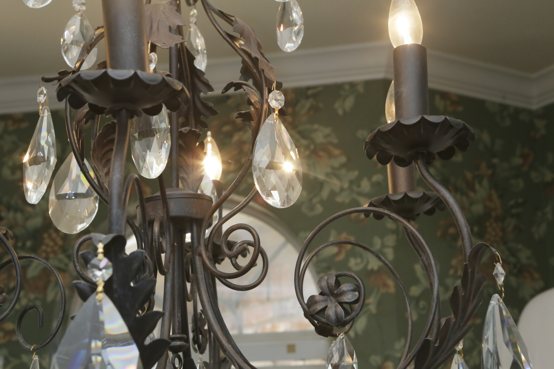 Patinaed Metal and Crystal Six Light Chandelier