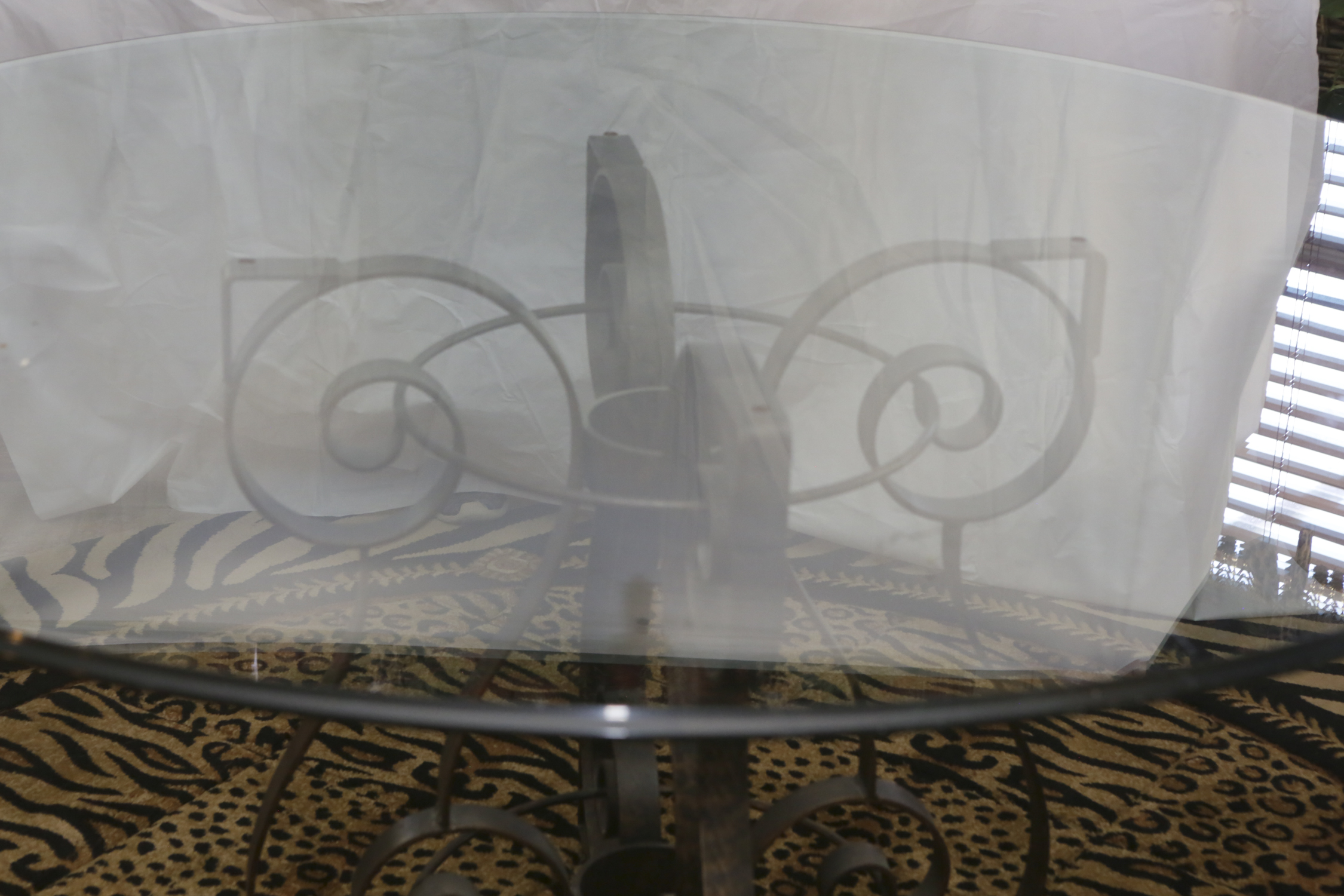 Glass Dining Table with Scrolling Metal Base