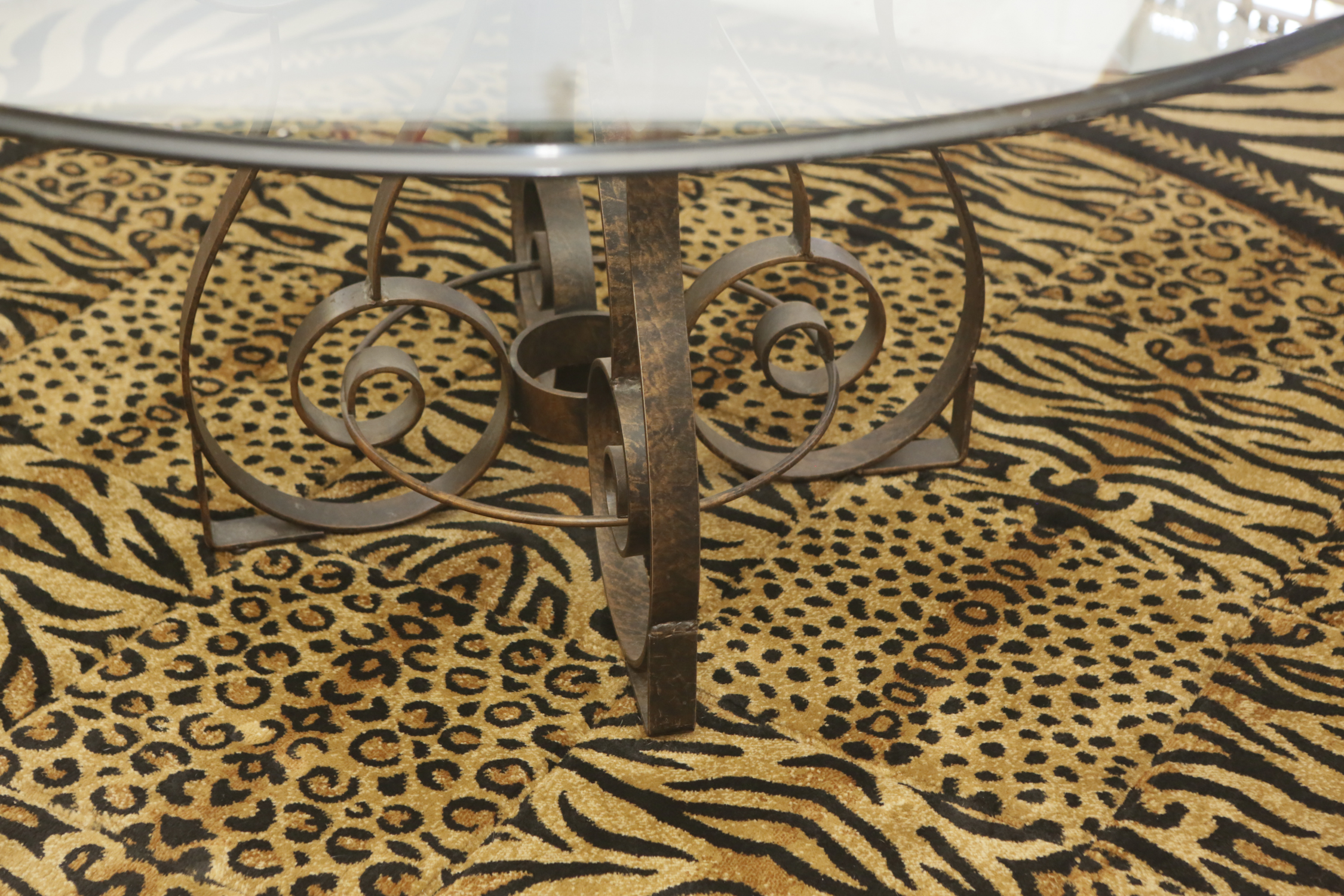 Glass Dining Table with Scrolling Metal Base