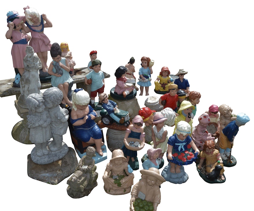 Assortment of Concrete Children Statues