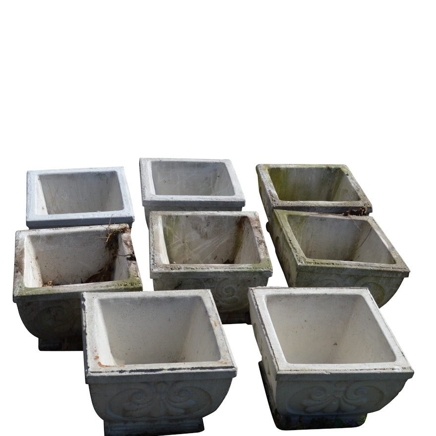 Twelve Decorative Cast Concrete Planters