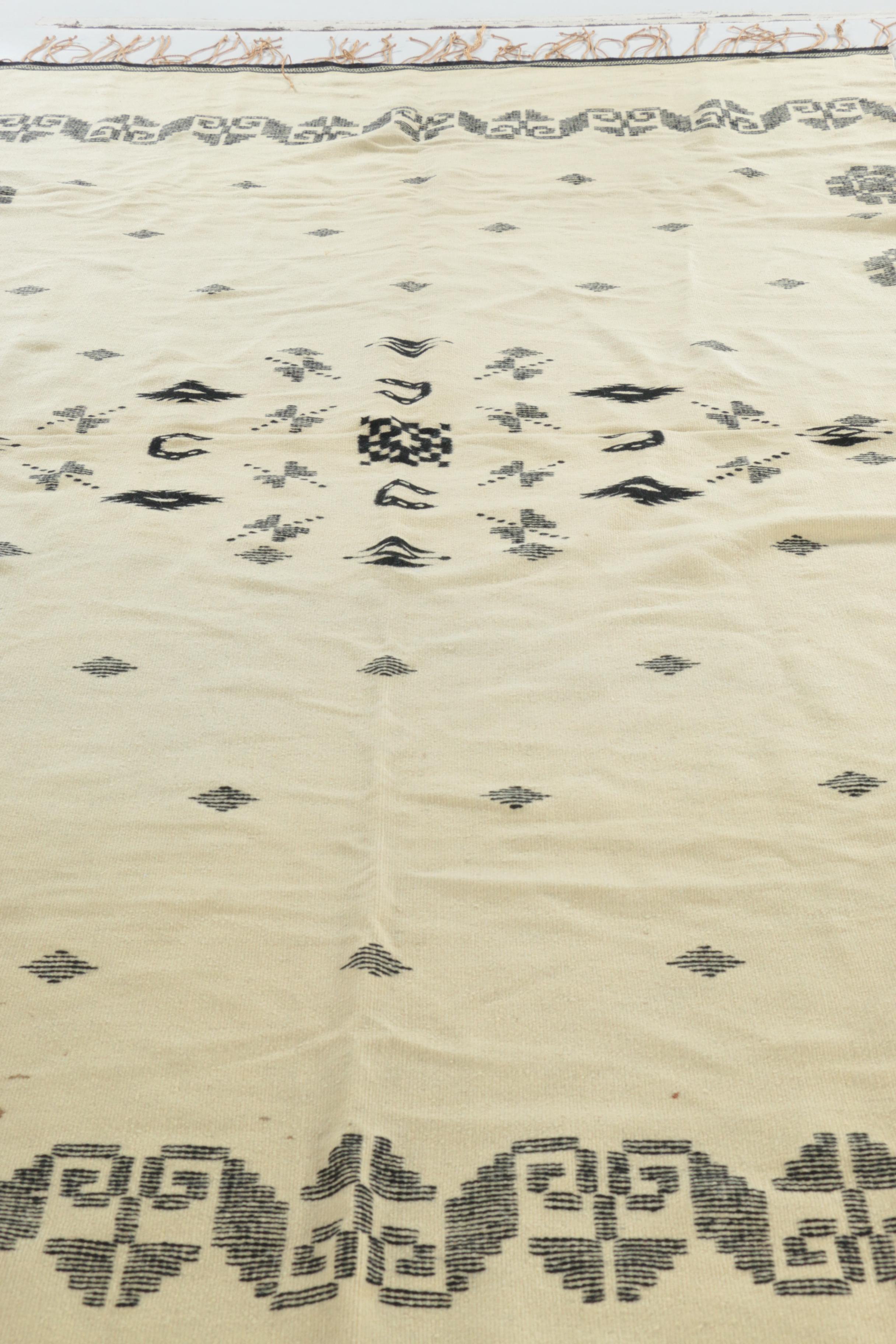 Handwoven and Embroidered Wool Area Rug