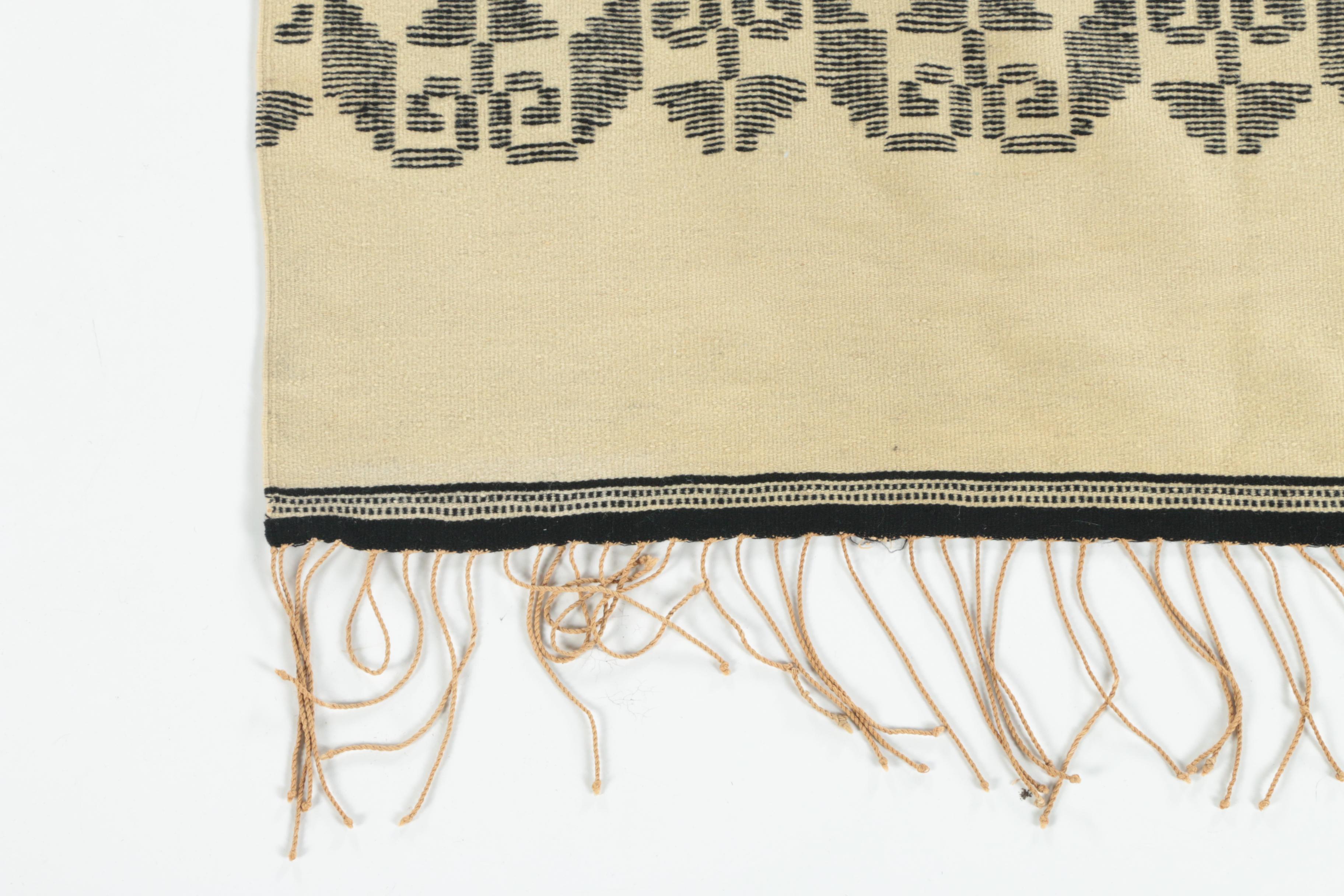 Handwoven and Embroidered Wool Area Rug