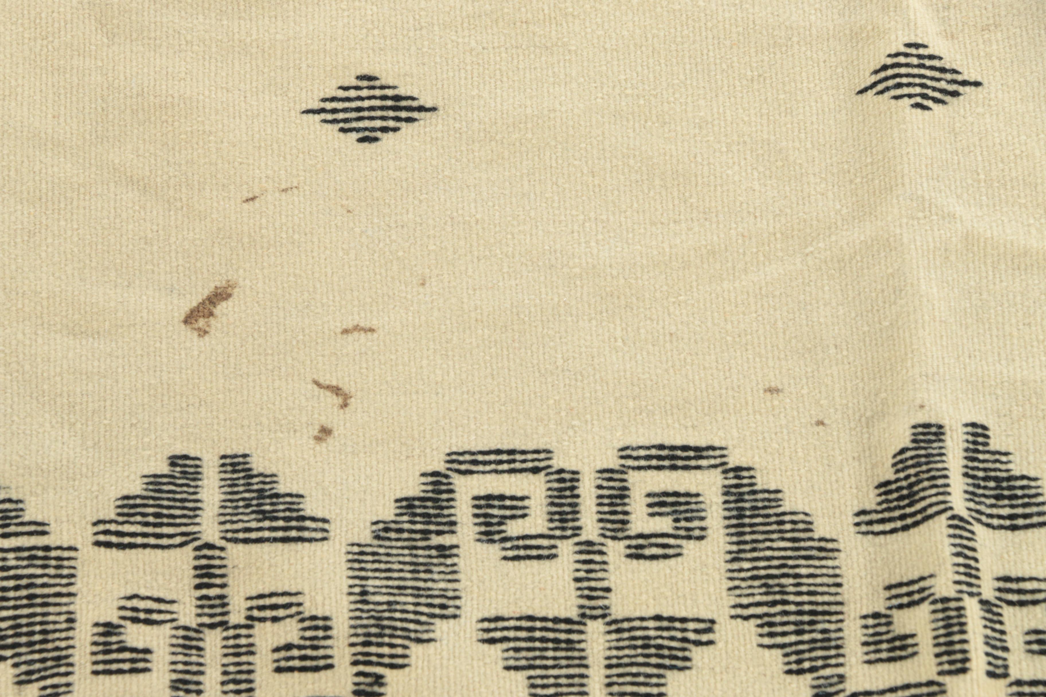 Handwoven and Embroidered Wool Area Rug