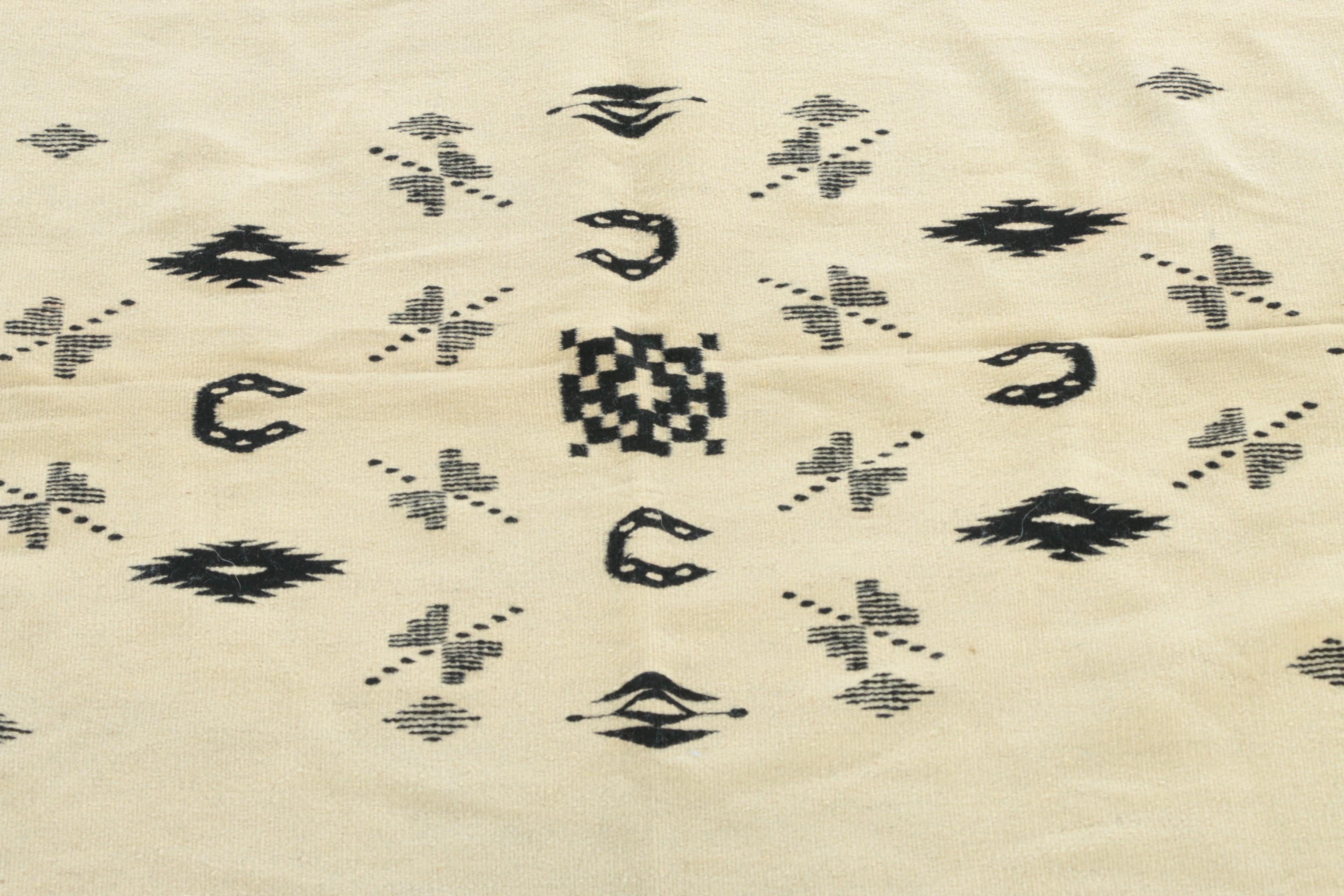Handwoven and Embroidered Wool Area Rug