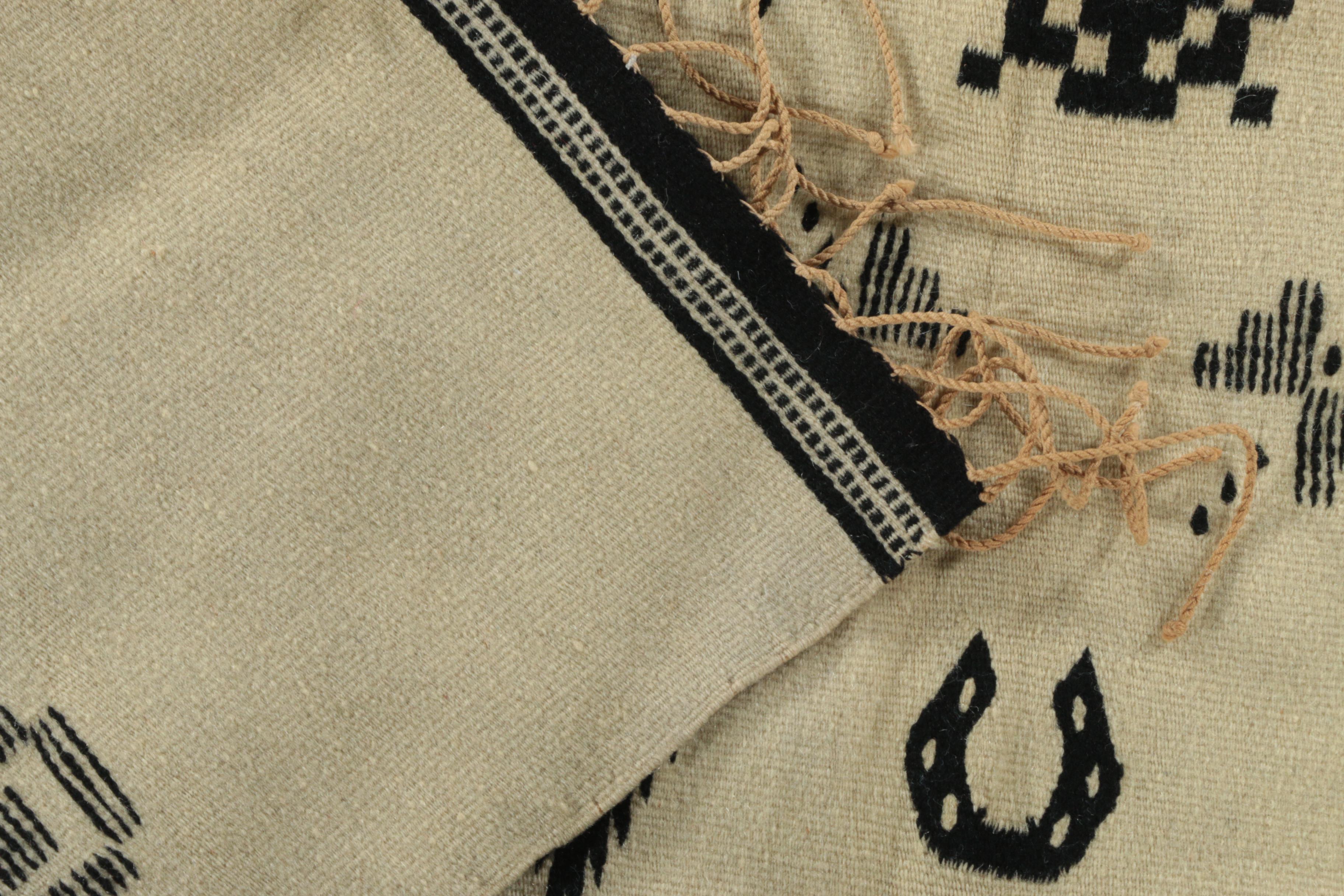 Handwoven and Embroidered Wool Area Rug