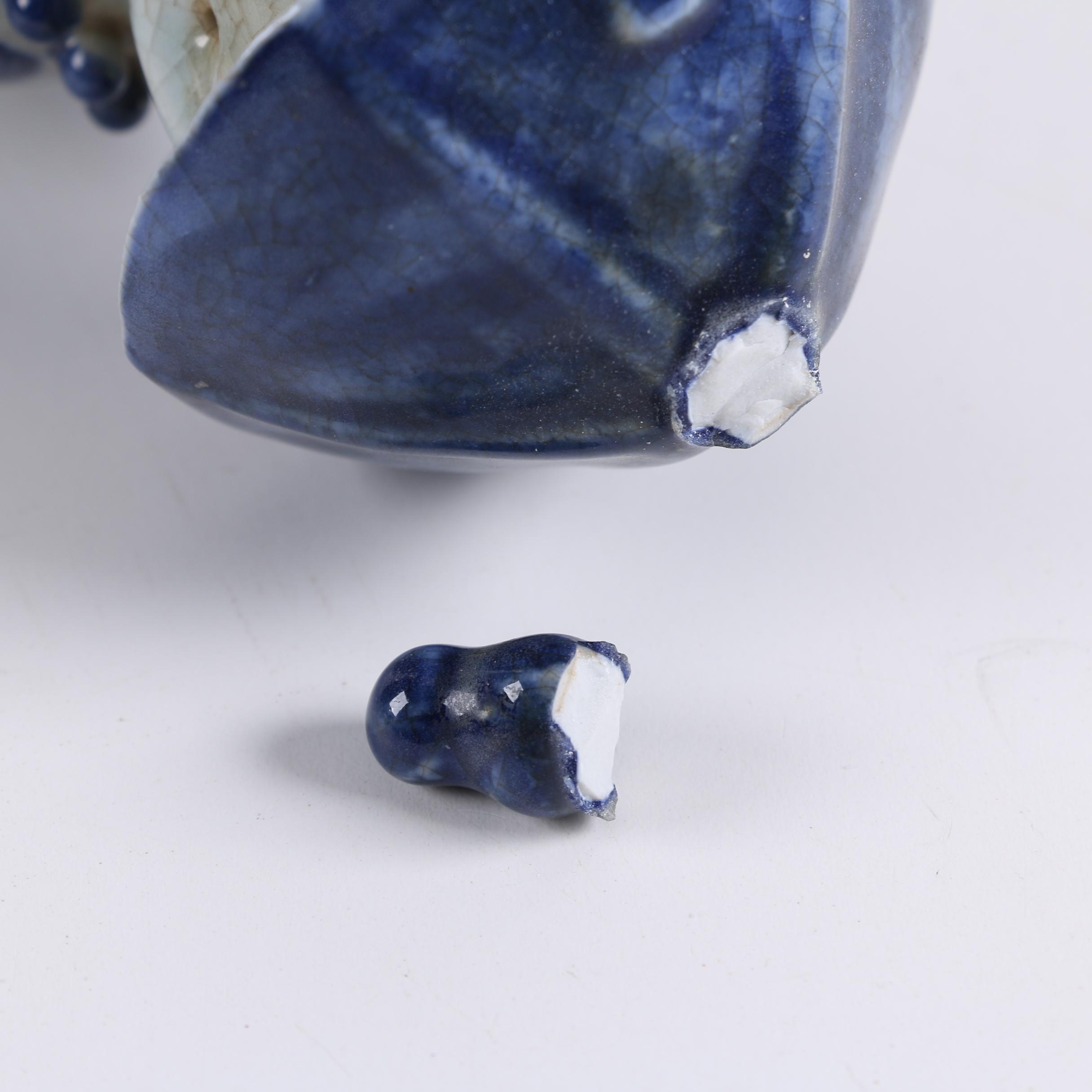 Pair of Chinese Blue and White Ceramic Figurines