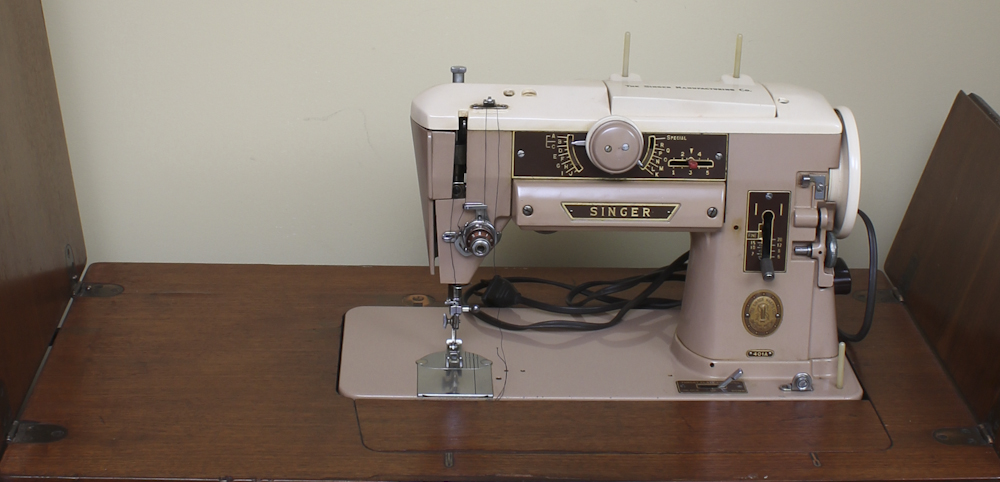 Art Deco Era Sewing Machine Table with a Pink Singer 401 A Machine