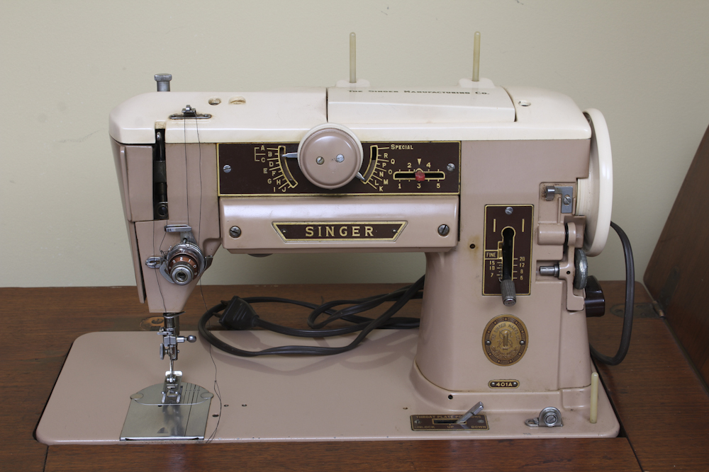 Art Deco Era Sewing Machine Table with a Pink Singer 401 A Machine