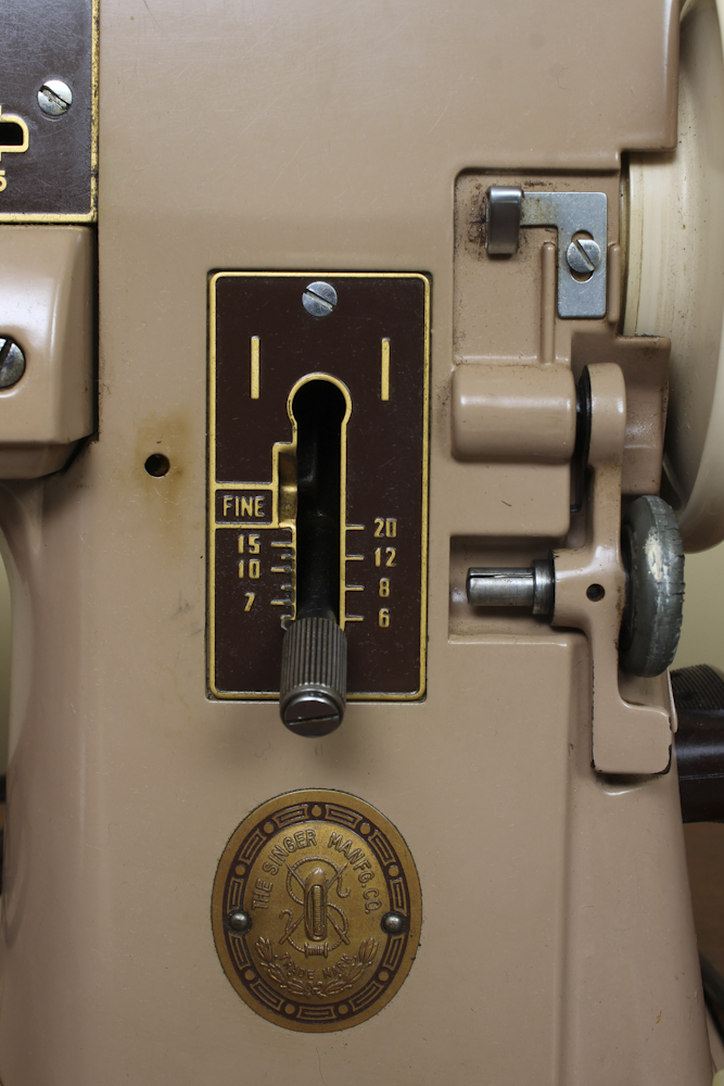 Art Deco Era Sewing Machine Table with a Pink Singer 401 A Machine