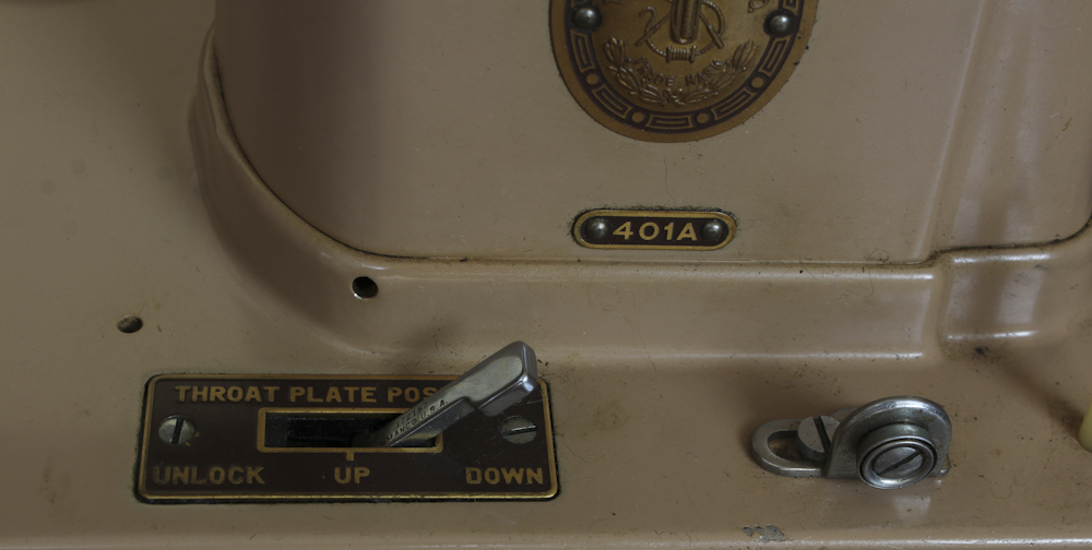 Art Deco Era Sewing Machine Table with a Pink Singer 401 A Machine